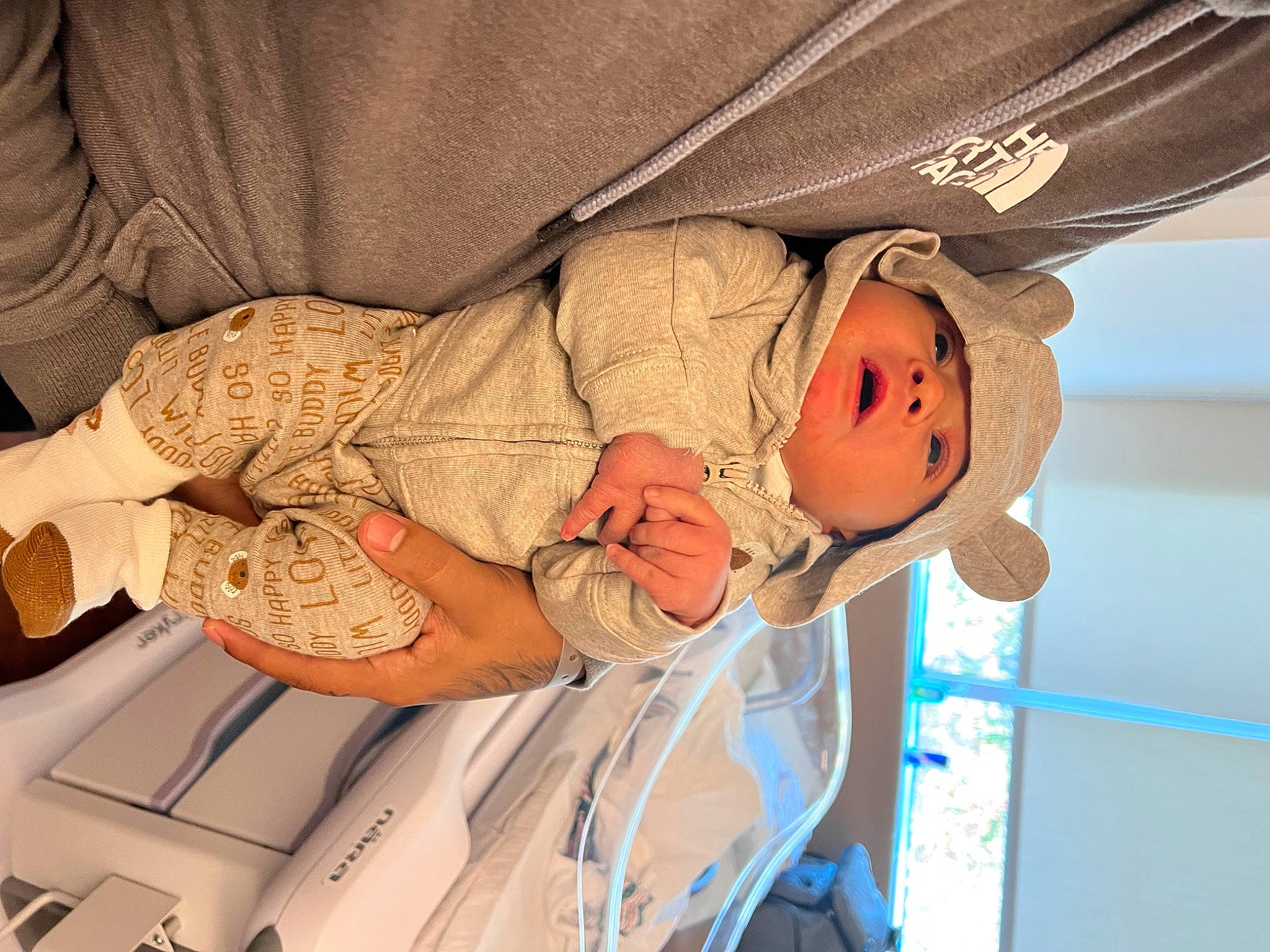 Everett is registered to the contest to win money with this photo: abdomen, baby, baby_products, child, comfort, hat, headwear, human, linens, mammal, people, person, room, sleep, textile, toddler, wood