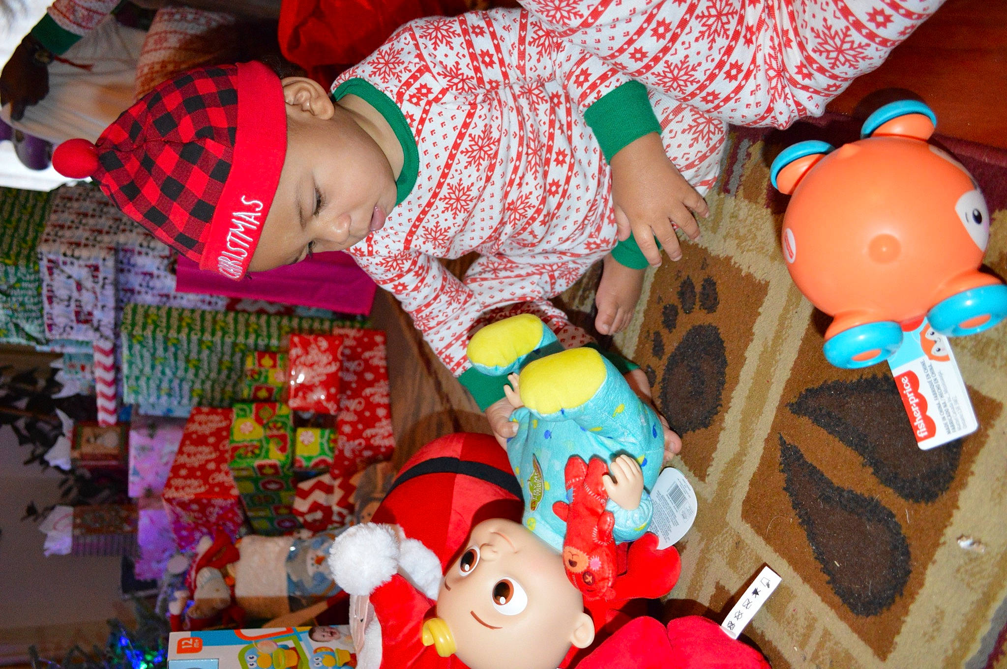 Jadon is registered to the contest to win money with this photo: baby, child, event, fun, happy, hat, headwear, holiday, leisure, orange, pattern, person, pink, plush, product, red, snapshot, stuffed_toy, textile, toddler