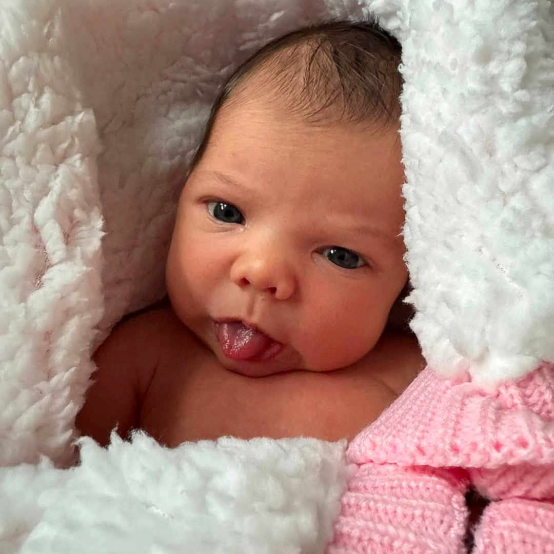Oaklyn joined the competition — help win amazing prizes! baby, blanket, face, head, newborn, person, photography, portrait, yawning