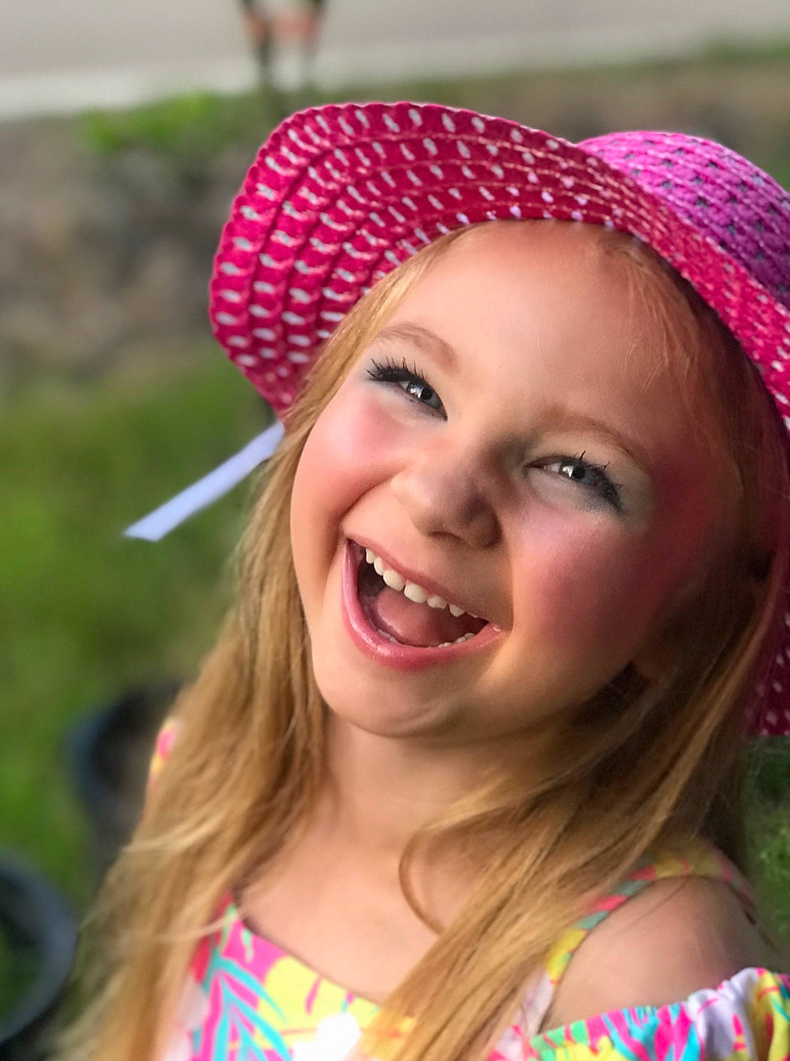 Daphne is registered to the contest to win money with this photo: beanie, cap, child, child_model, clothing, fashion_accessory, hair_accessory, happy, hat, headgear, headwear, joy, knit_cap, laugh, lip, person, pink, portrait_photography, smile, sun_hat