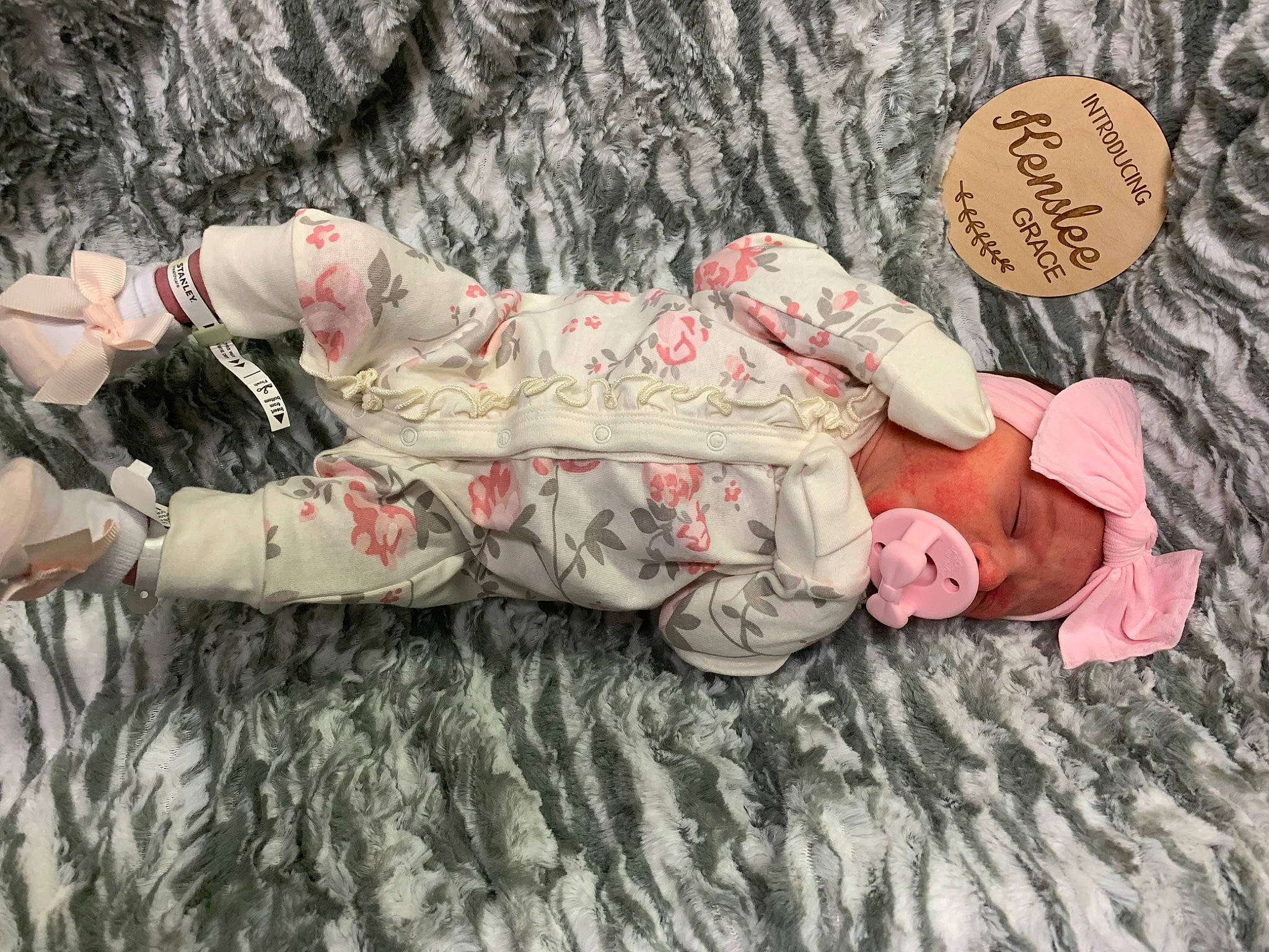 Kenslee joined the competition — help win amazing prizes! arm, comfort, facial_expression, finger, gesture, grass, happy, head, headgear, human_body, human_leg, leg, mammal, military_camouflage, pattern, person, pink, skin, textile, thigh