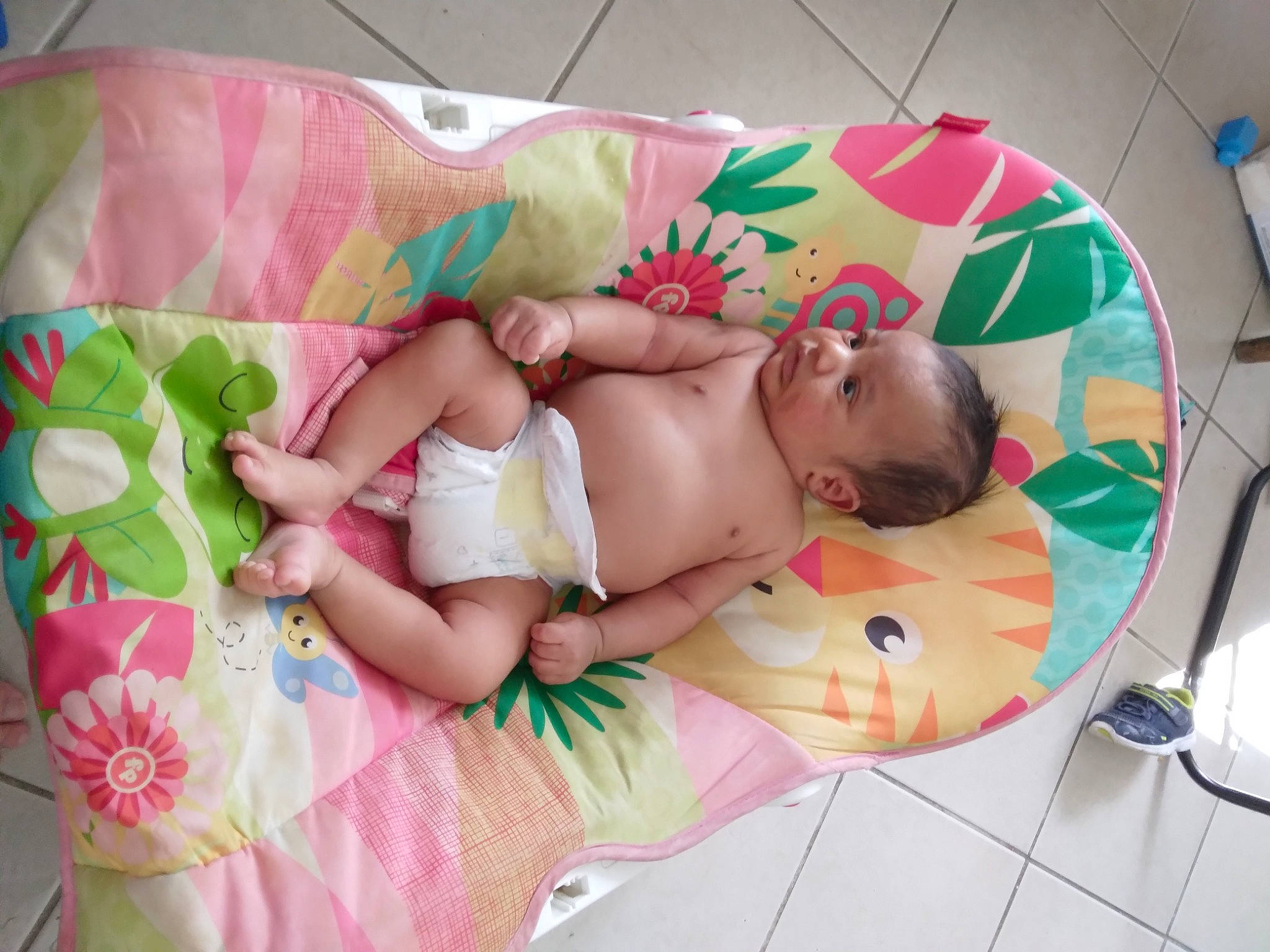 Eli is registered to the contest to win money with this photo: abdomen, art, baby, baby_products, baby_safety, baby_toddler_clothing, bedtime, chest, child, comfort, diaper, linens, pattern, person, pink, room, sleep, stomach, thigh, toddler