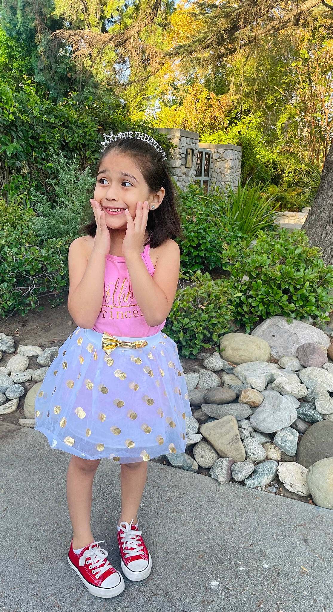 Dahlia is registered to the contest to win money with this photo: child, day_dress, dress, footwear, fun, grass, hairstyle, happy, joy, leaf, leisure, magenta, pattern, people_in_nature, person, pink, plant, recreation, smile, toddler