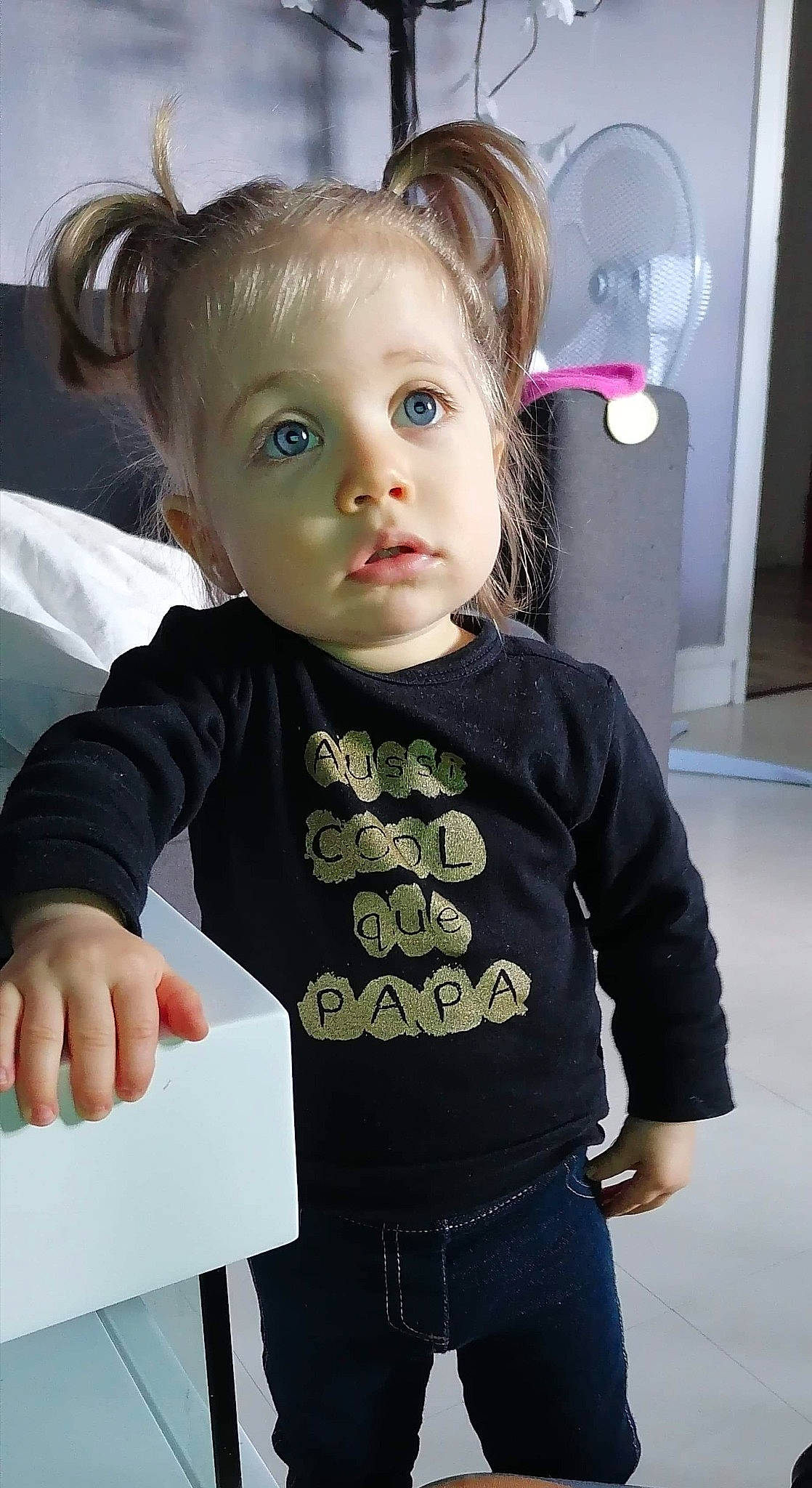 Ariana participe au concours pour gagner de l'argent avec cette photo : baby_toddler_clothing, blond, brown_hair, cheek, child, chin, doll, eye, eyelash, fun, hairstyle, iris, person, pink, skin, sleeve, standing, t_shirt, toddler, toy