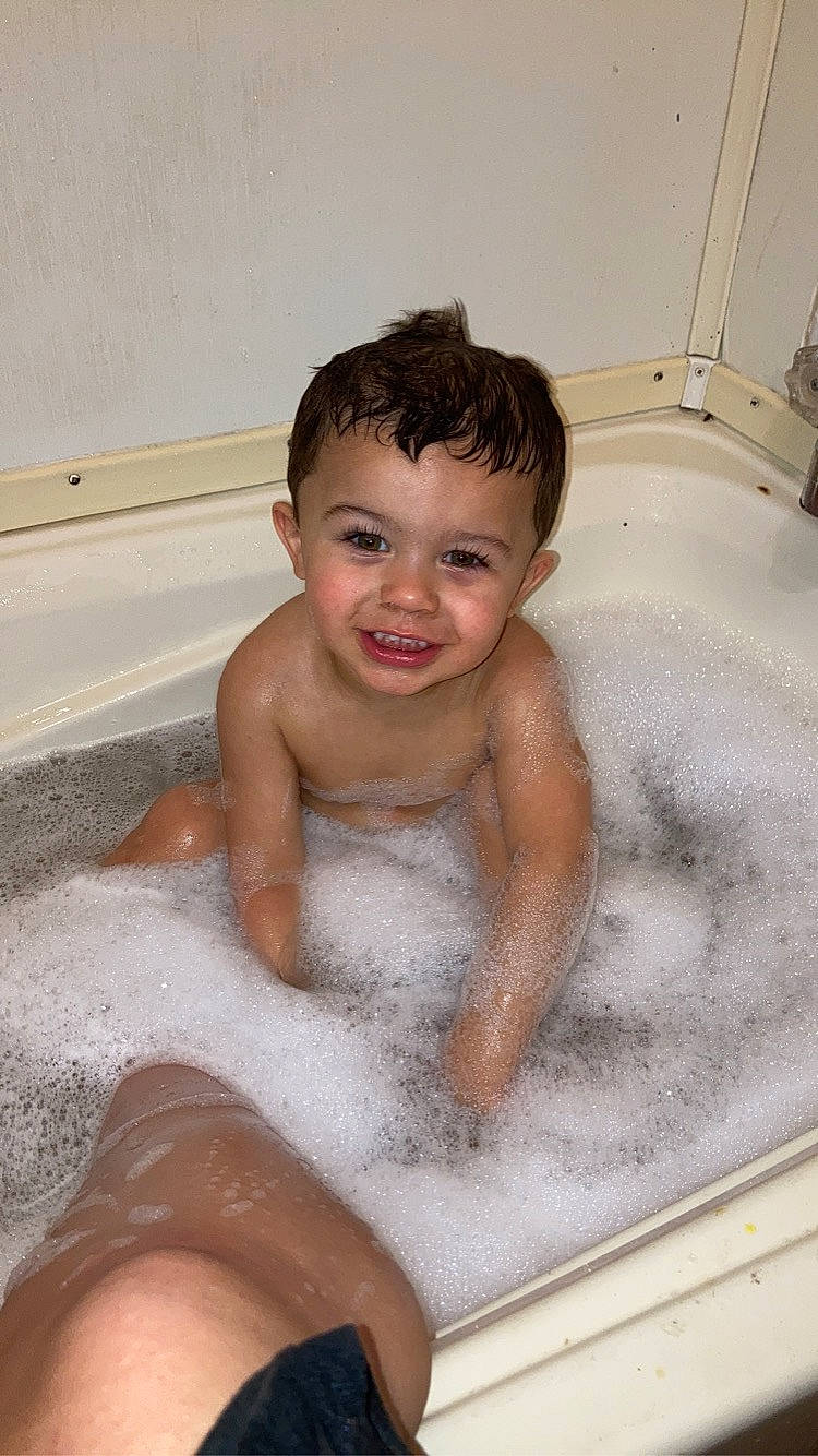 Augustus joined the competition — help win amazing prizes! baby_bathing, bathing, bathroom, bathtub, black, child, composite_material, eye, fluid, foam, joy, organ, person, personal_care, plumbing, plumbing_fixture, property, skin, smile, tap
