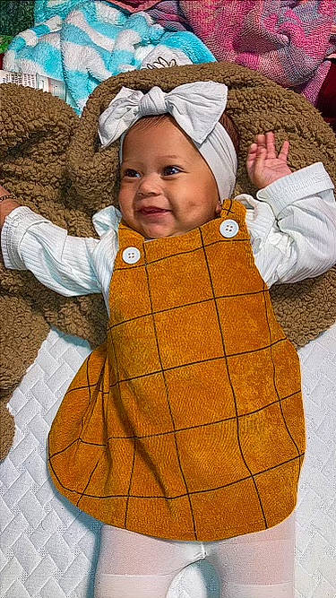 Jaliyah joined the competition — help win amazing prizes! baby, baby_toddler_clothing, cap, cheek, child, comfort, eye, finger, happy, headgear, headwear, knit_cap, linens, organ, outerwear, person, skin, sleeve, smile, toddler