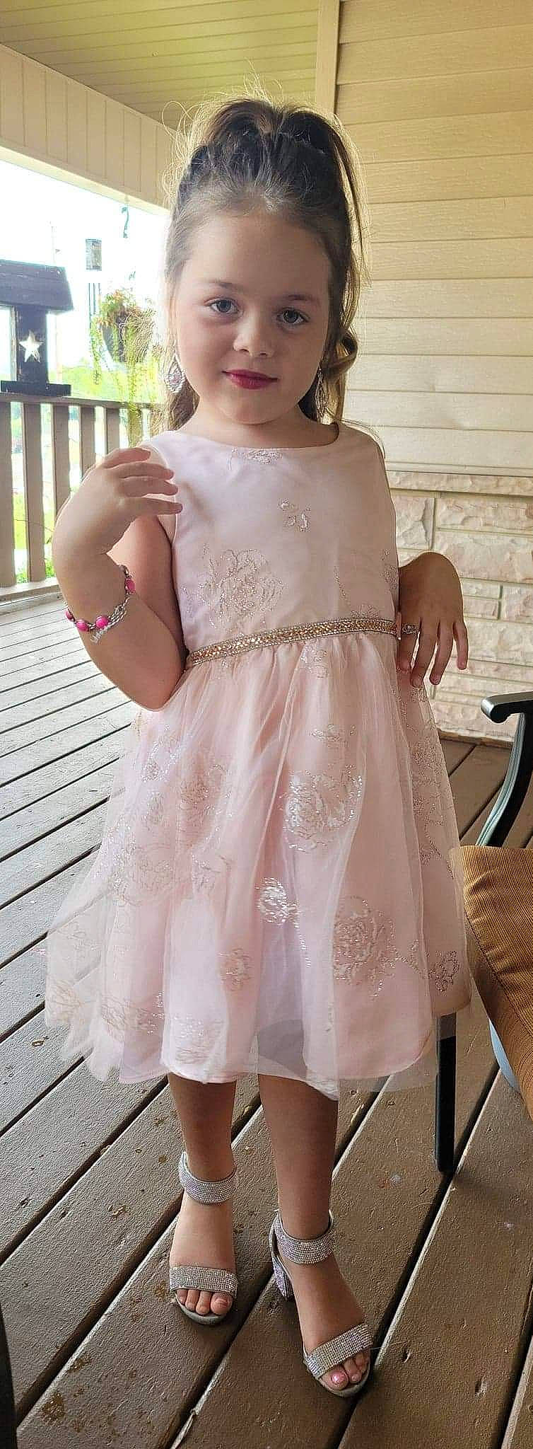Ashtyn is registered to the contest to win money with this photo: bridal_accessory, bridal_party_dress, day_dress, dress, fashion_design, finger, formal_wear, happy, joint, neck, one_piece_garment, person, pink, shoulder, skin, sleeve, snapshot, thigh, vision_care, waist