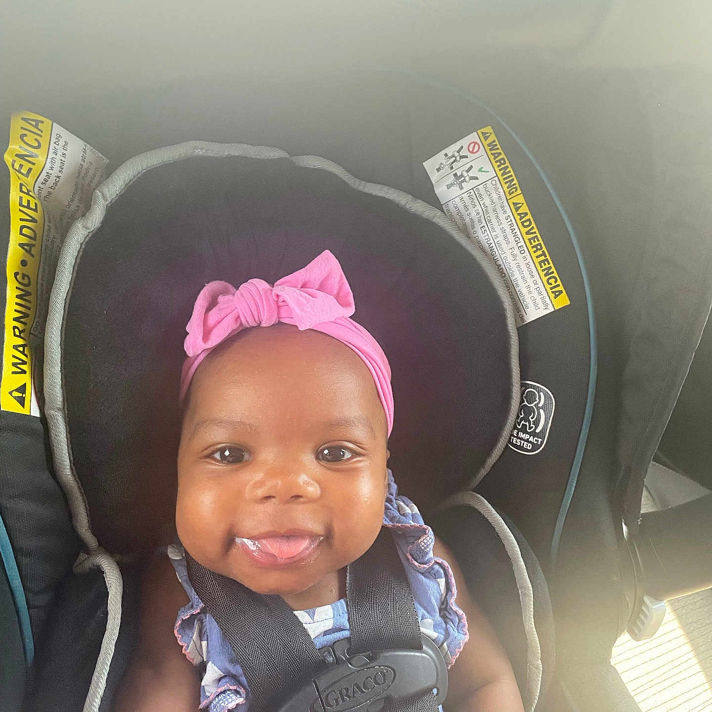 Autumn is registered to the contest to win money with this photo: accessories, baby, baseballcap, cap, car, clothing, cushion, face, happy, hat, head, homedecor, person, photography, portrait, smile, stroller, sunglasses, transportation, vehicle