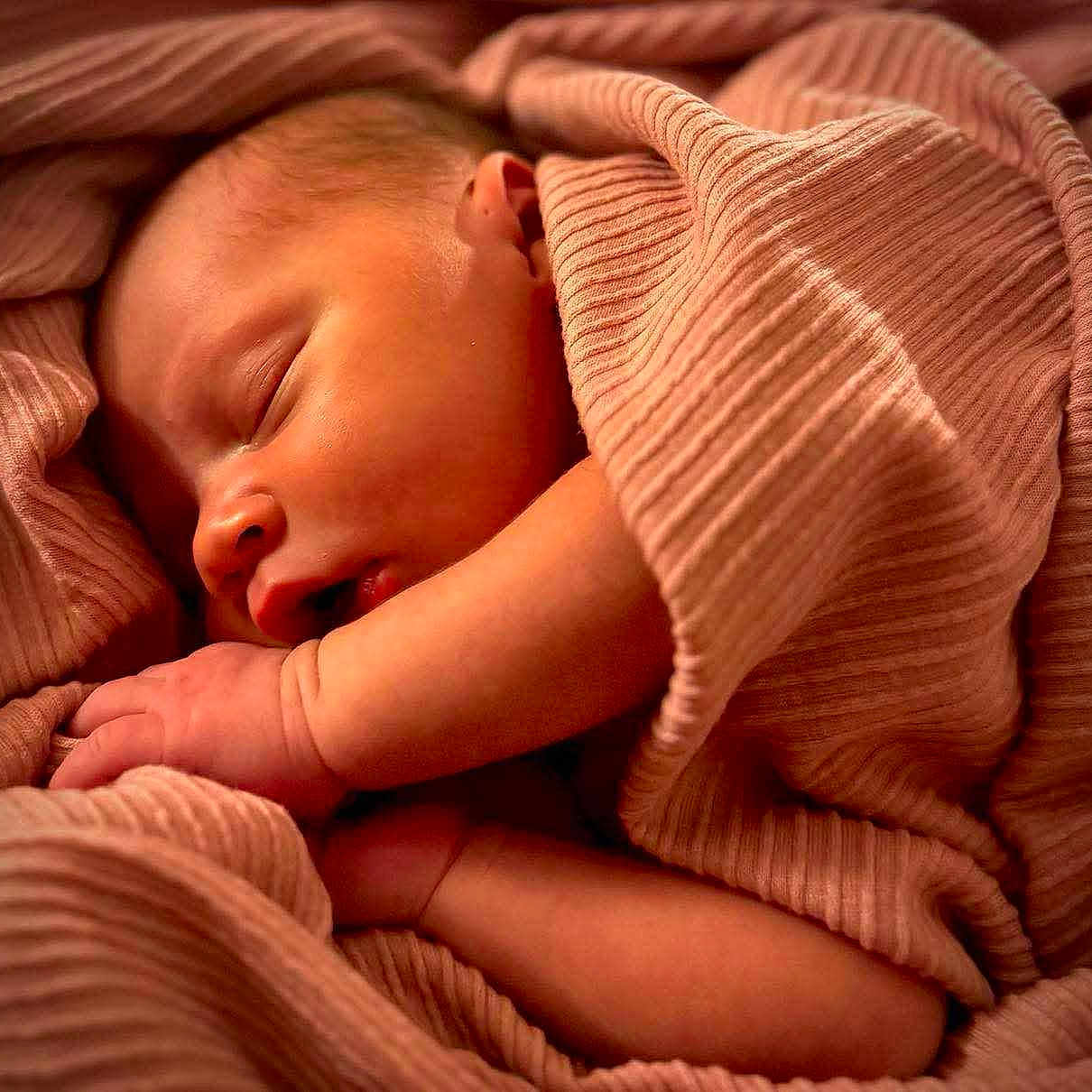 Kairi is registered to the contest to win money with this photo: baby, blanket, face, head, newborn, person, photography, portrait, quilt, sleeping