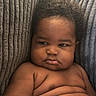 baby, infant, child, diaper, cute, chubby, rolls, skin, face, expression, couch, cushion, texture, indoor, portrait, person, young, sitting, closeup, comfortable