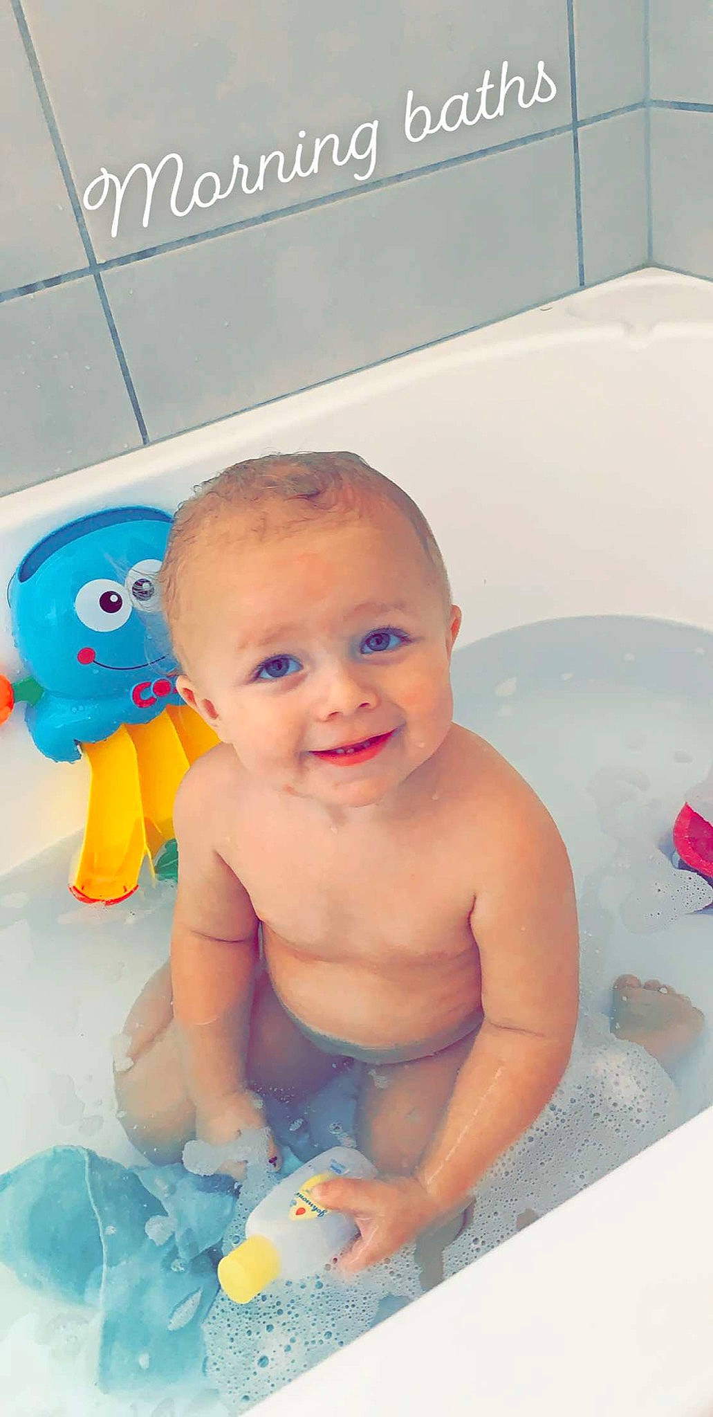 Maxson joined the competition — help win amazing prizes! baby, baby_bathing, baby_products, bath_toy, bathing, bathtub, child, fun, joy, person, personal_care, plumbing_fixture, product, smile, toddler, toy