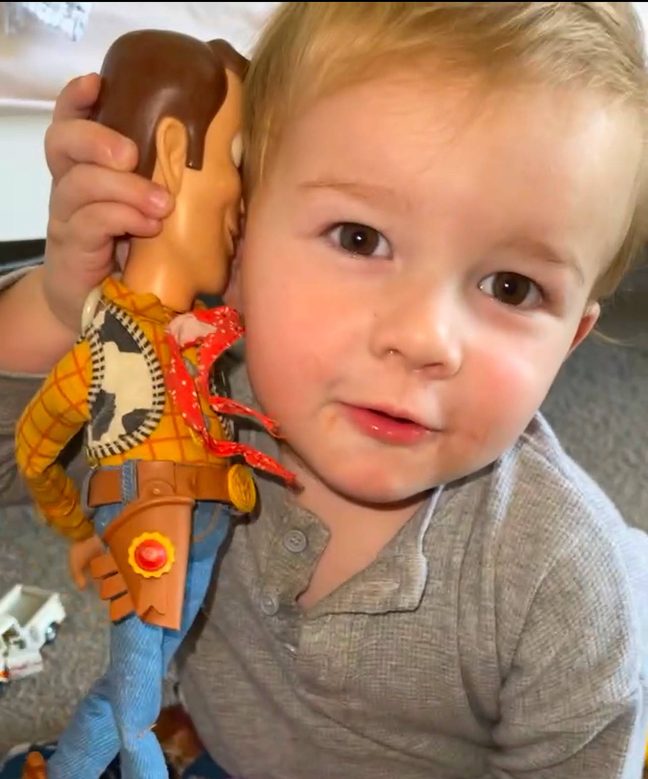 Kodah is registered to the contest to win money with this photo: cheek, child, chin, cool, ear, eyelash, facial_expression, finger, fun, gesture, hand, happy, mammal, mouth, neck, nose, person, skin, t_shirt, toddler