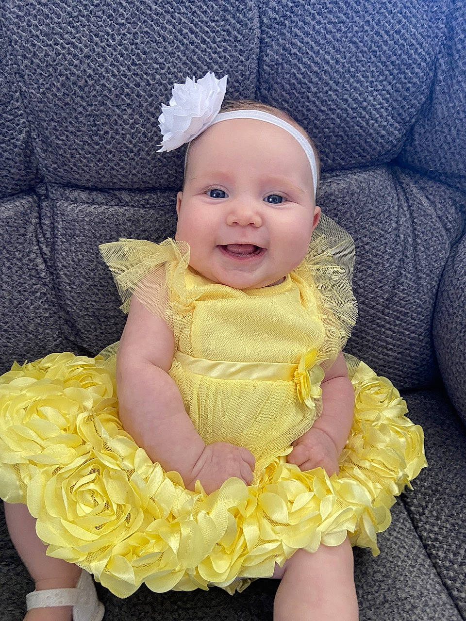 Wrenlyn joined the competition — help win amazing prizes! baby, baby_toddler_clothing, costume_hat, couch, dress, event, face, happy, hat, headband, headgear, headpiece, jewellery, joy, person, petal, pink, purple, smile, toddler