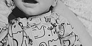 Gabriel joined the competition — help win amazing prizes! animal_print, baby, child, closeup, comfort, cute, elephant, face, happy, infant, monochrome, newborn, onesie, patterned_clothing, person, resting, sleeping, sleepwear, smiling, soft
