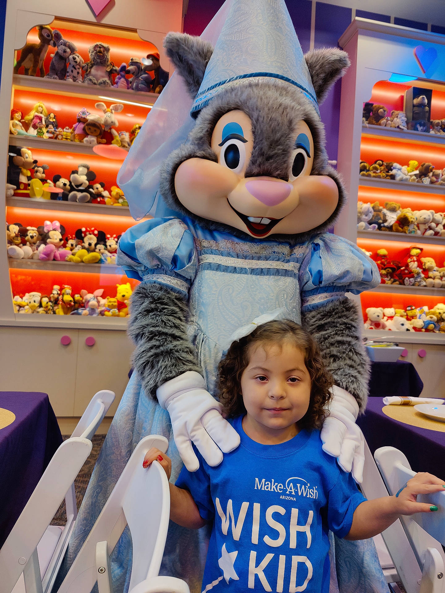 baby, bodypart, box, chair, clothing, face, finger, furniture, glove, hat, head, indoors, mascot, people, person, photography, plate, portrait, shelf, toy