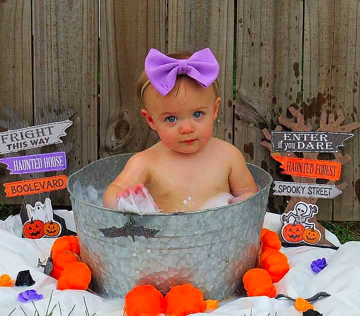 Macie joined the competition — help win amazing prizes! baby, baby_products, baby_toddler_clothing, bathing, cheek, child, crown, eyelash, fashion_accessory, font, fun, hair_accessory, happy, headband, headpiece, headwear, jewellery, natural_foods, person, photo_caption