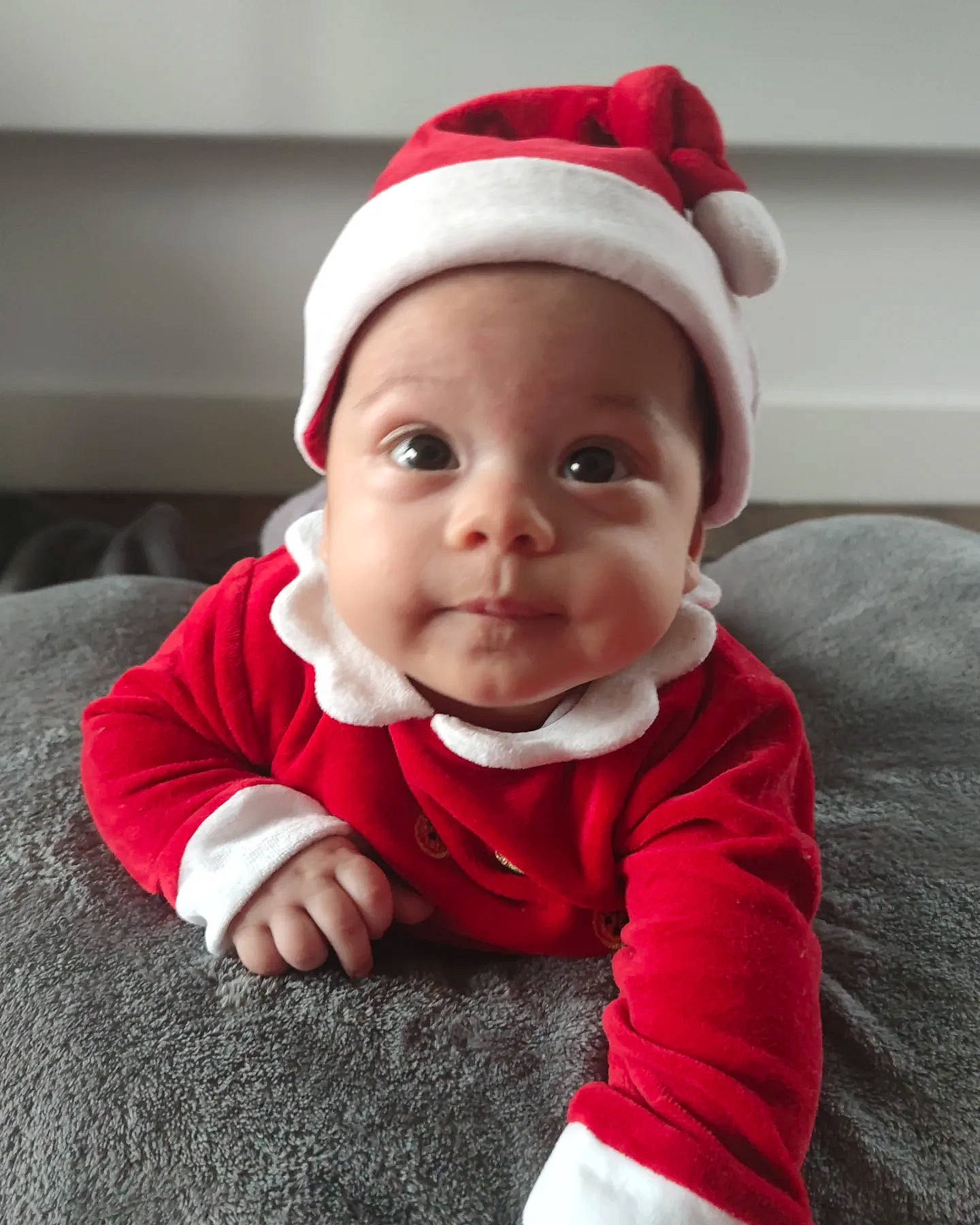 Luna joined the competition — help win amazing prizes! baby, baby_toddler_clothing, beanie, cap, carmine, cheek, child, comfort, costume_hat, event, flooring, fun, fur, happy, headwear, outerwear, person, portrait_photography, sitting, sleeve