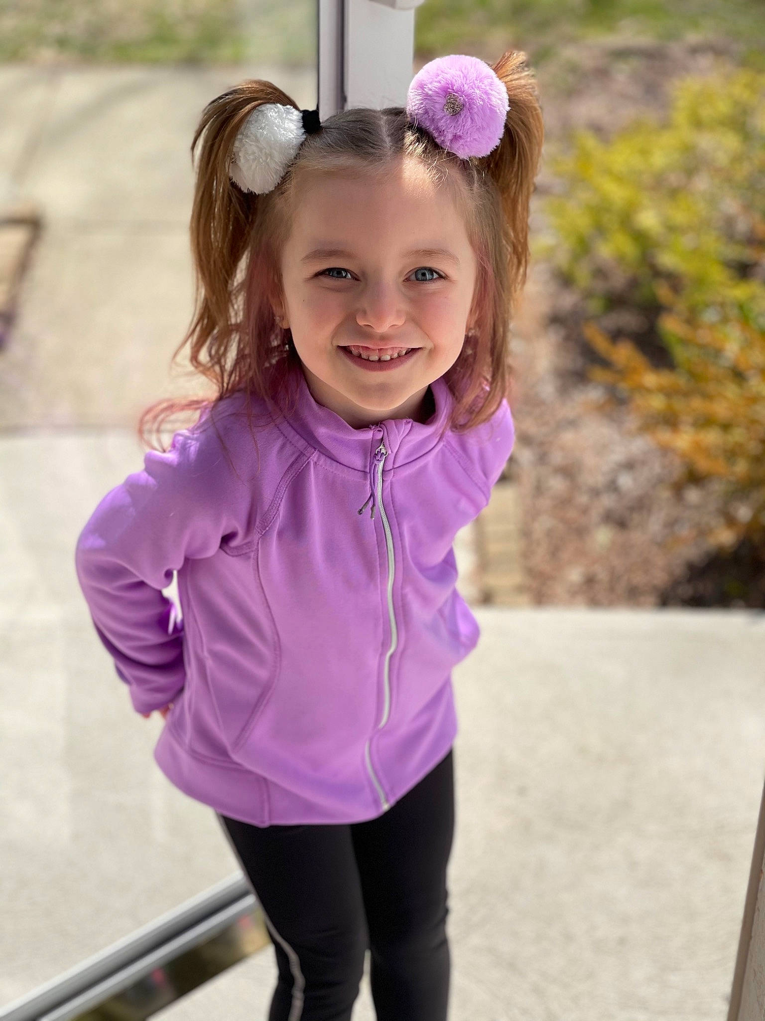 Ivory is registered to the contest to win money with this photo: active_pants, arm, clothing, eye, face, hair, happy, head, headgear, human_body, iris, joy, person, pink, plant, purple, shoulder, sleeve, smile, standing