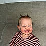 Maddy a rejoint le concours — aidez-le/la à gagner de superbes lots ! child, baby, toddler, smile, laughing, couch, sofa, striped_shirt, clothing, sitting, face, teeth, drool, red_eye, hair_spikes, indoor, portrait, happy, giggle, headboard