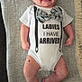Theodore joined the competition — help win amazing prizes! baby, infant, smiling, onesie, bow_tie, text, blanket, lying_down, cute, happy, person, skin, face, arm, leg, foot, clothing, pattern, indoor, portrait