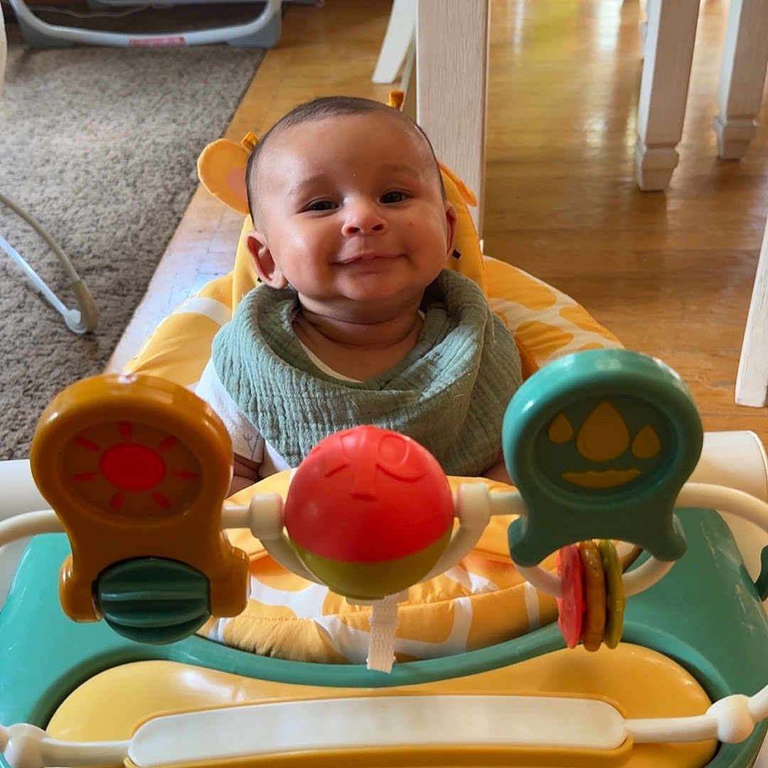 Jensen is registered to the contest to win money with this photo: architecture, baby, building, cream, cutlery, dessert, diningroom, diningtable, face, food, furniture, head, indoors, person, photography, portrait, room, spoon, table, wood