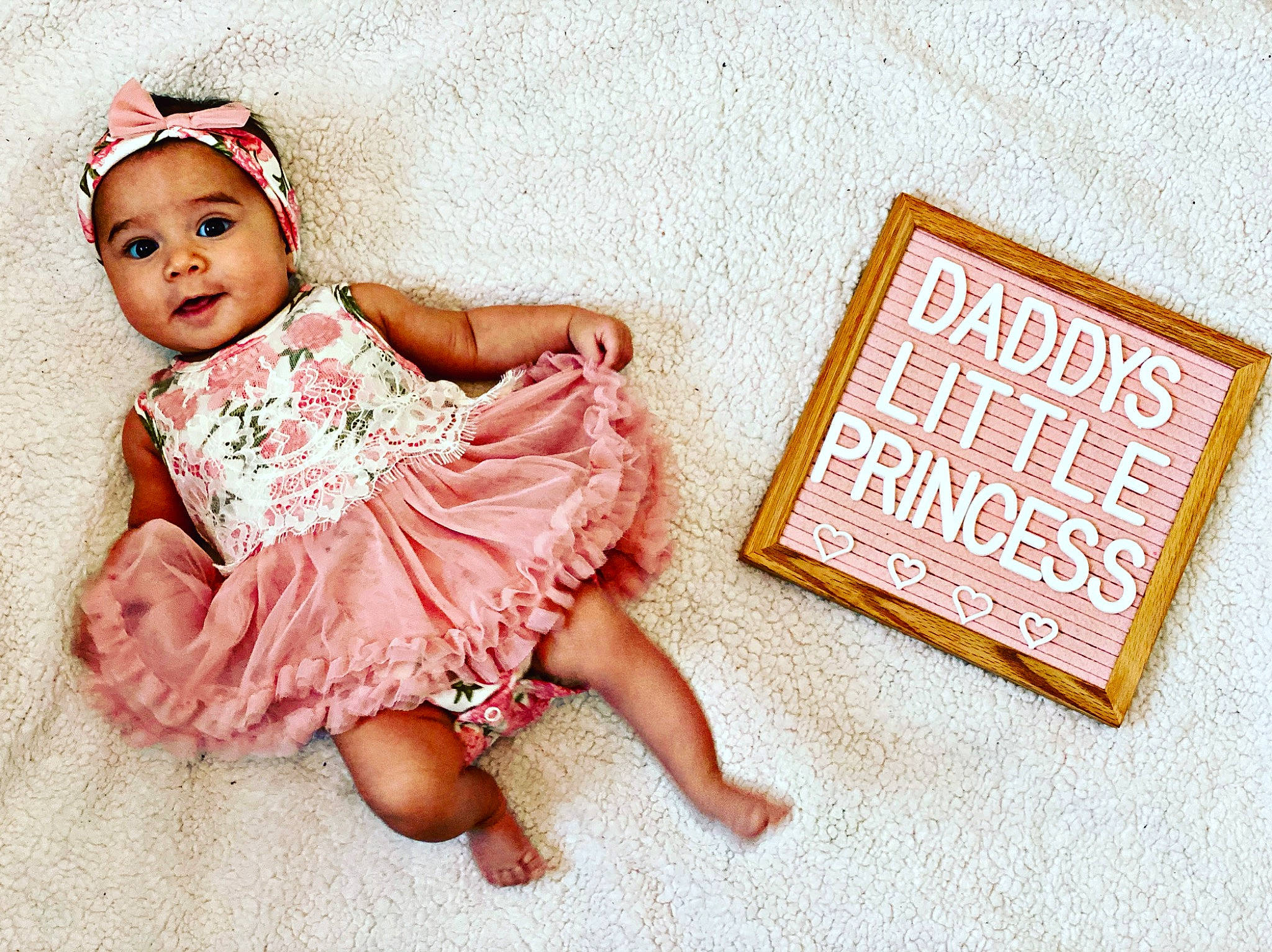 Lilyanna is registered to the contest to win money with this photo: baby, baby_toddler_clothing, child, child_model, dress, fashion_accessory, font, hair_accessory, headband, headgear, headpiece, headwear, person, photography, pink, product, toddler