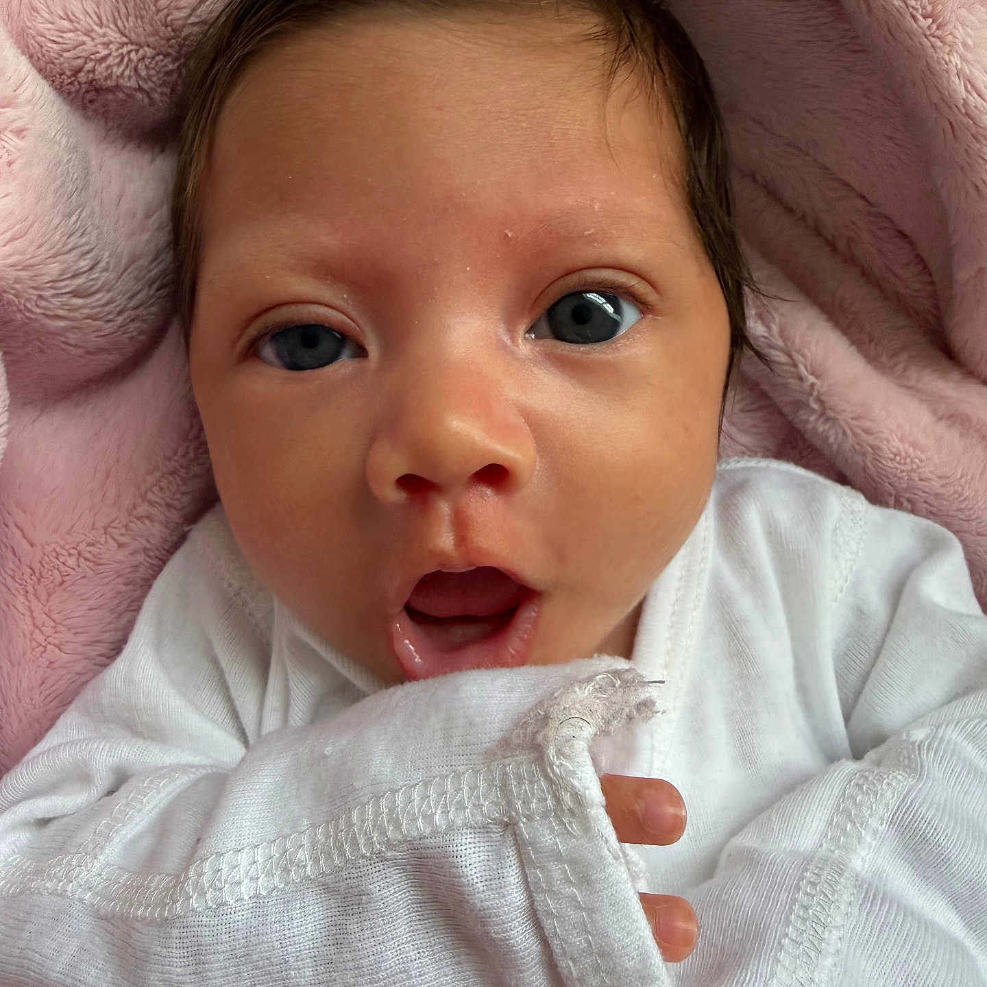Allysson joined the competition — help win amazing prizes! newborn, baby, infant, portrait, face, eyes, wide_eyed, open_mouth, white_clothing, pink_blanket, cozy, lying_down, indoor, closeup, head, hands, soft_lighting, adorable, photography, child