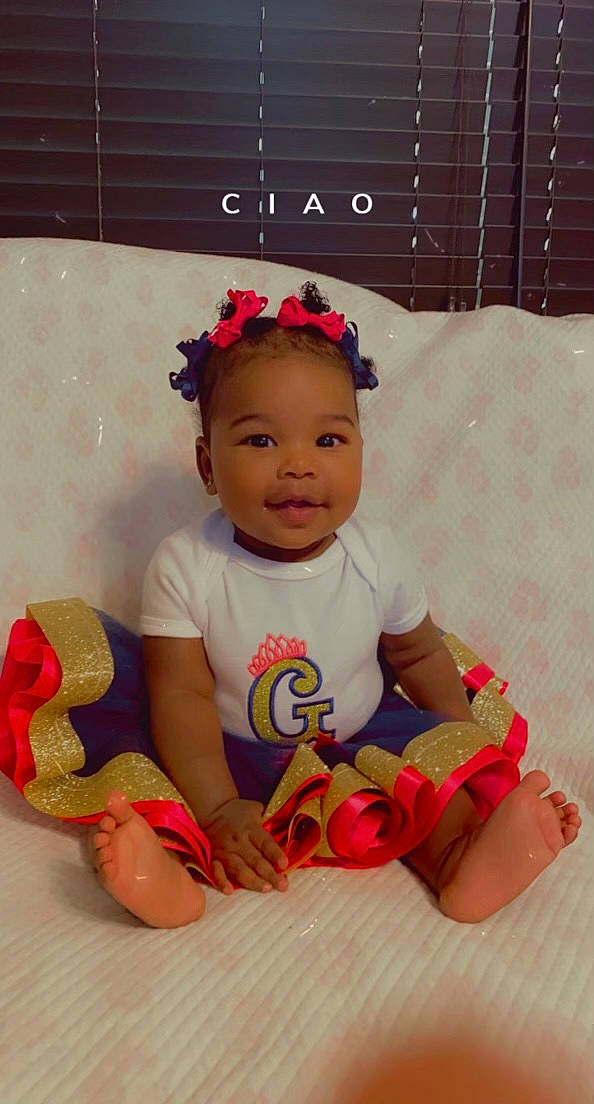 Gianna is registered to the contest to win money with this photo: baby, baby_products, baby_toddler_clothing, baby_toys, cheek, child, costume, fashion_accessory, fun, happy, headband, headgear, human_leg, person, pink, play, skin, sleeve, smile, t_shirt