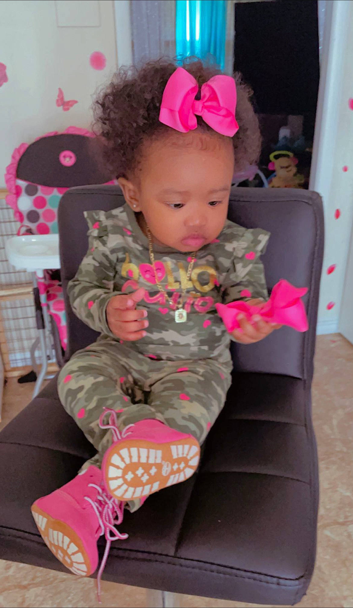 Onijujuah joined the competition — help win amazing prizes! baby, baby_toddler_clothing, cheek, child, comfort, curtain, eyelash, fashion_accessory, hair_accessory, human_leg, magenta, outerwear, pattern, person, pink, sitting, skin, sleeve, sock, thigh