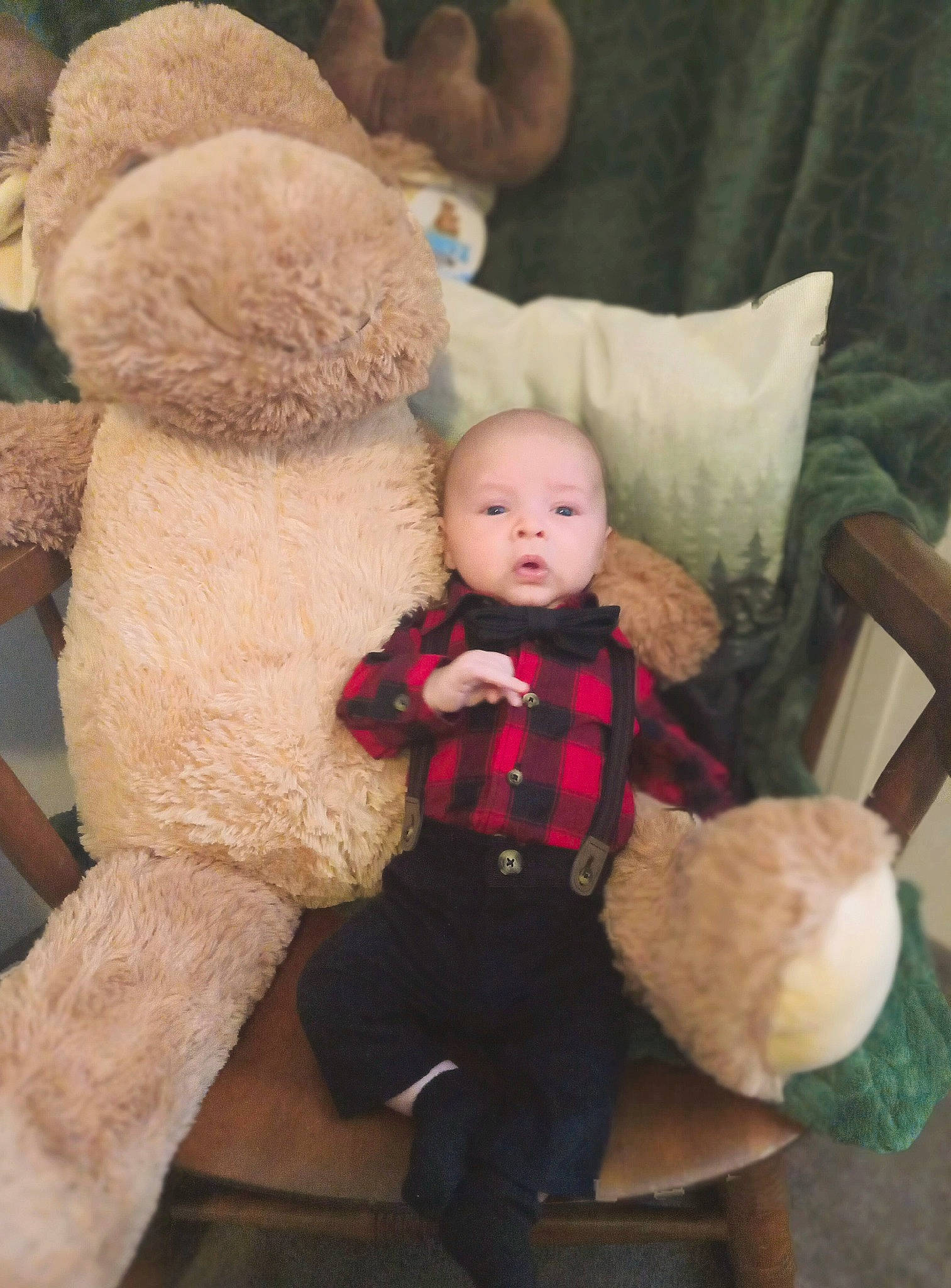 Kai is registered to the contest to win money with this photo: baby_toys, cheek, child, comfort, doll, fawn, fur, head, human_body, lap, person, plush, sitting, skin, stuffed_toy, tartan, teddy_bear, textile, toy, wood