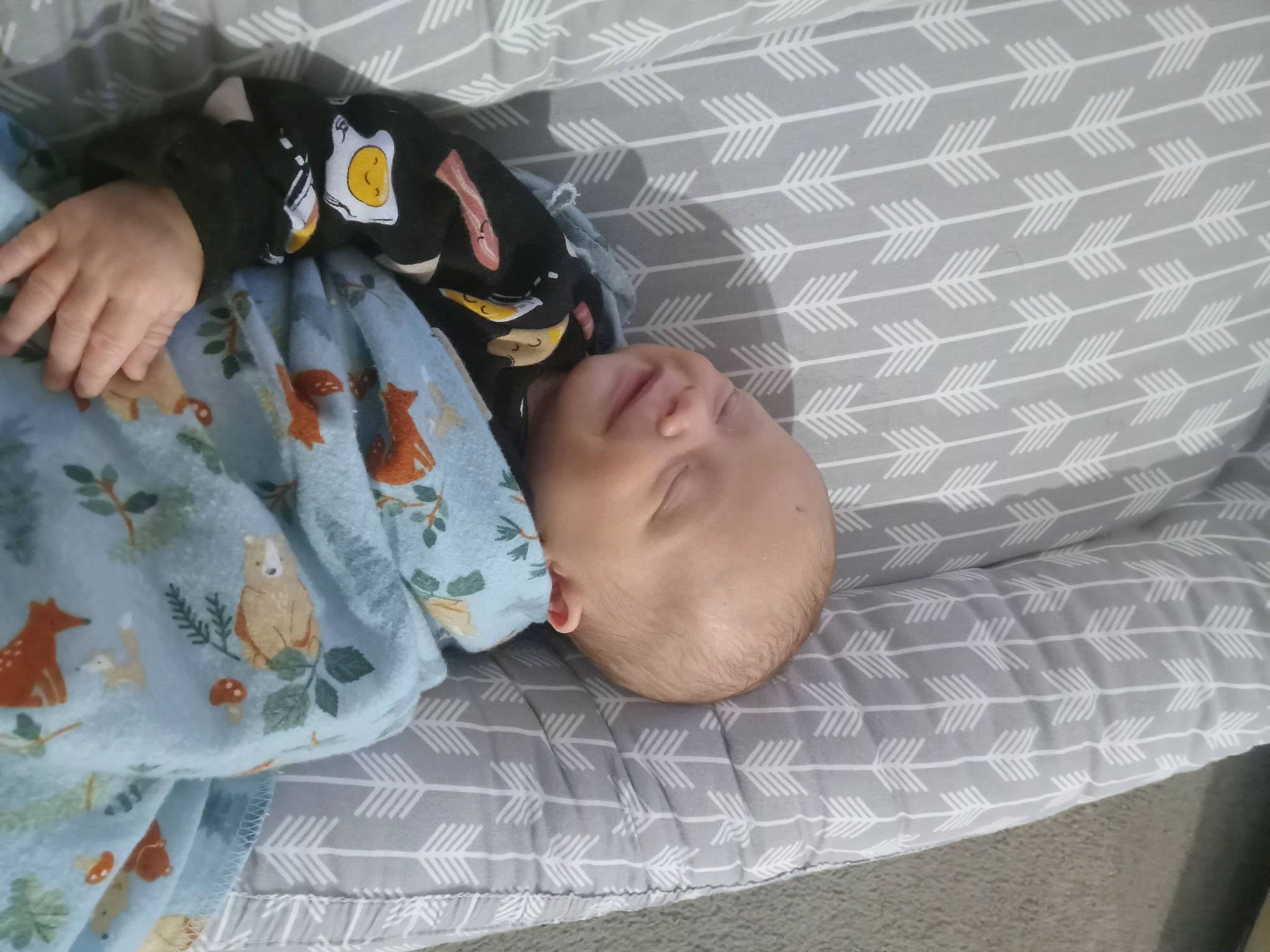 Kai is registered to the contest to win money with this photo: baby, baby_products, baby_toddler_clothing, bedding, bedtime, child, comfort, grey, linens, nap, pattern, person, room, sitting, sleep, sleeve, toddler, wood
