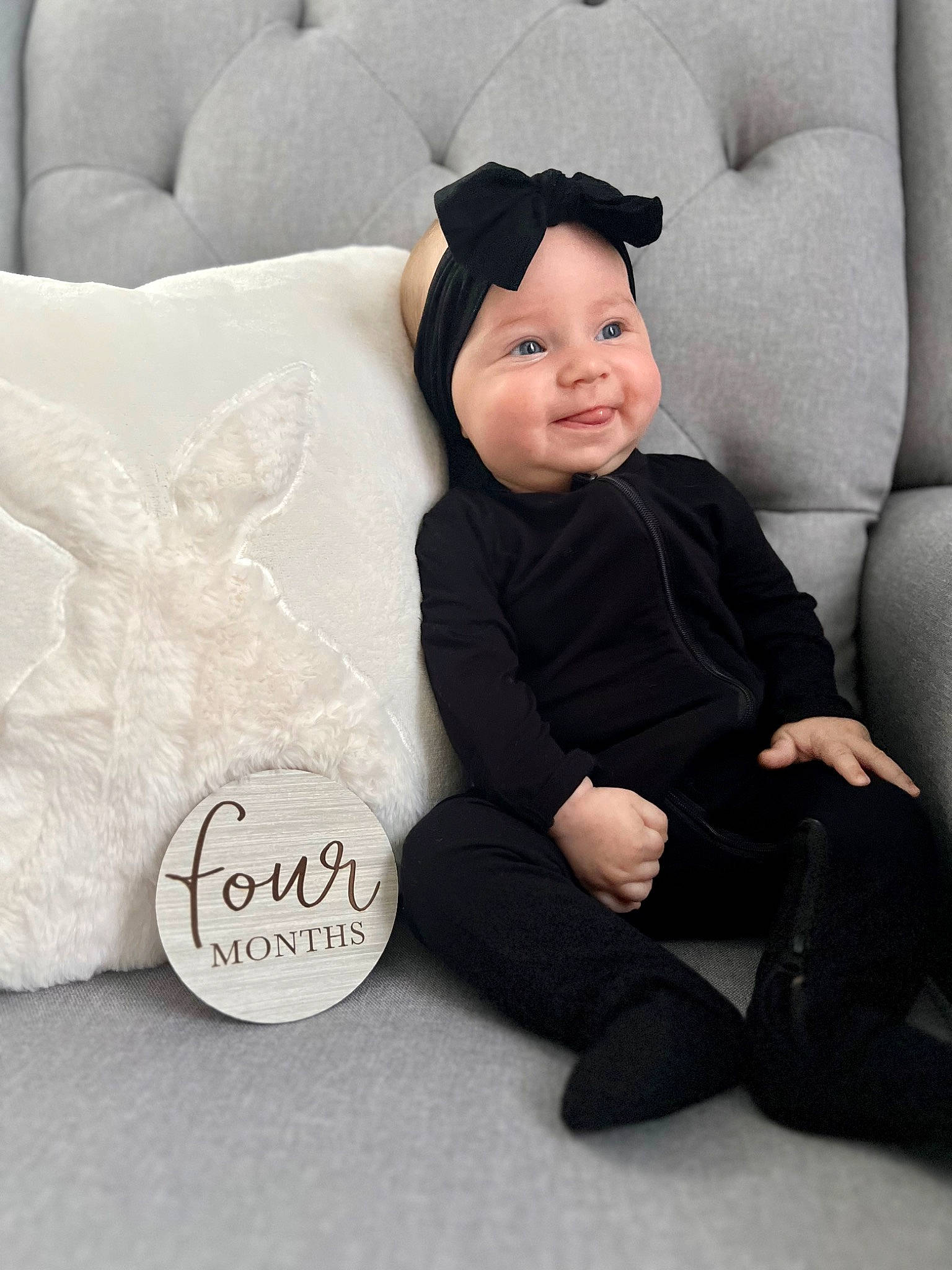 Lane joined the competition — help win amazing prizes! baby, baby_toddler_clothing, child, comfort, font, grey, happy, hat, headwear, joy, linens, outerwear, person, product, room, sitting, sleeve, smile, t_shirt, textile