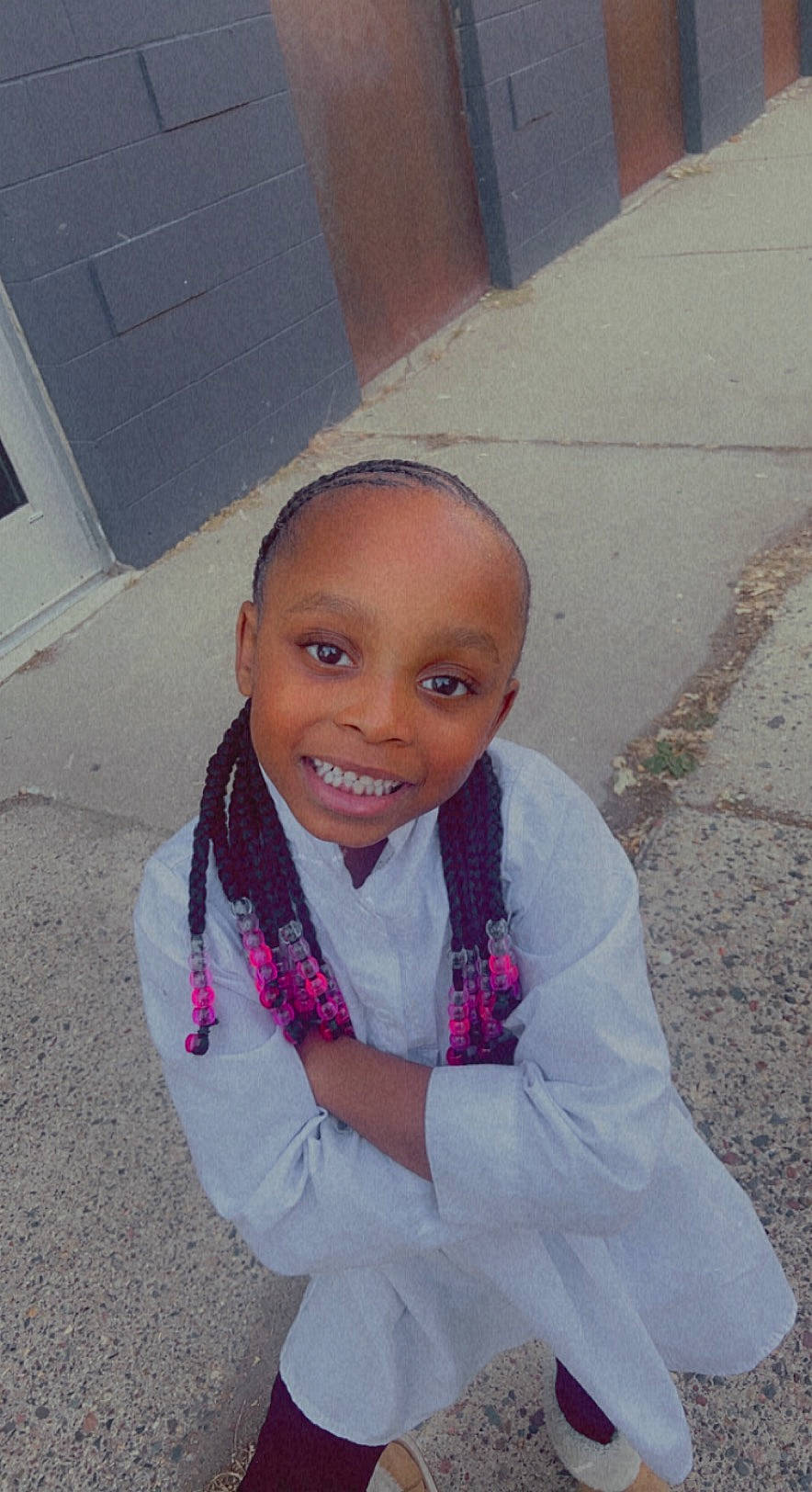 Dalilah joined the competition — help win amazing prizes! asphalt, electric_blue, eyebrow, fashion_accessory, flooring, fun, gesture, happy, iris, joy, leisure, lip, magenta, person, pink, play, recreation, road, road_surface, sitting