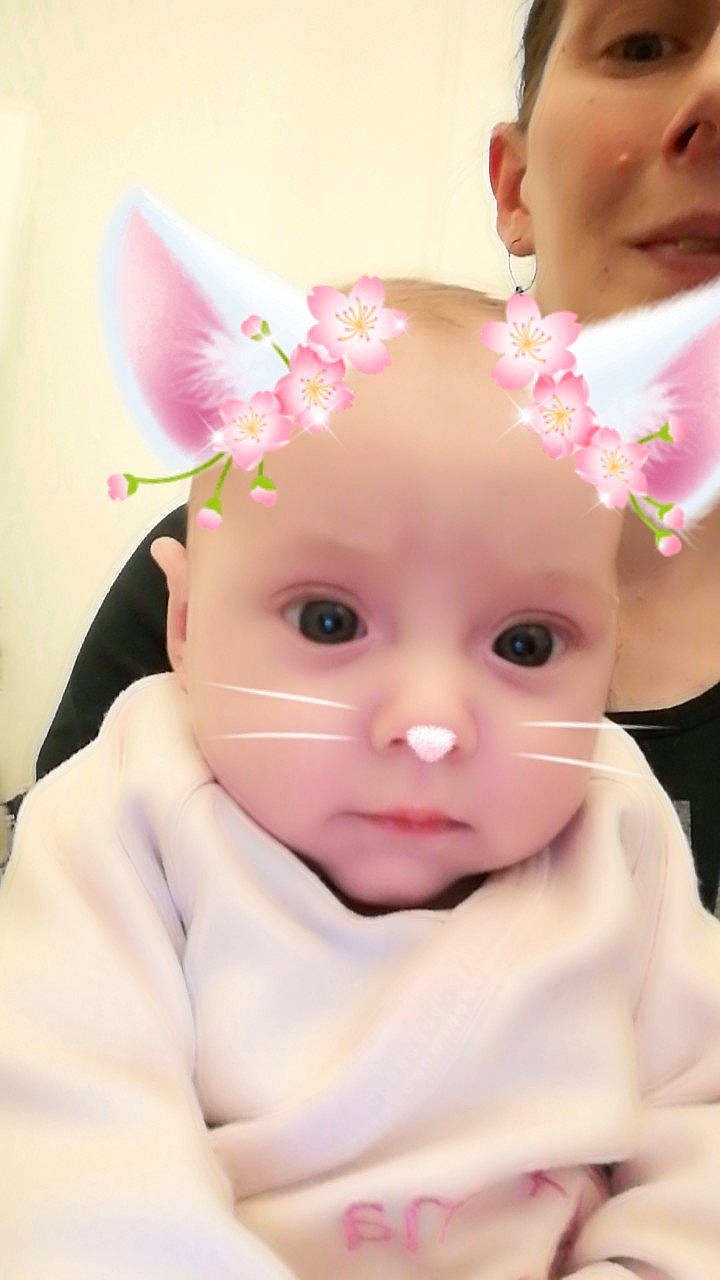 Louana participe au concours pour gagner de l'argent avec cette photo : baby_toddler_clothing, cheek, chin, dress, ear, eye, eyebrow, eyelash, face, head, iris, lip, neck, nose, person, petal, product, skin, sleeve, textile