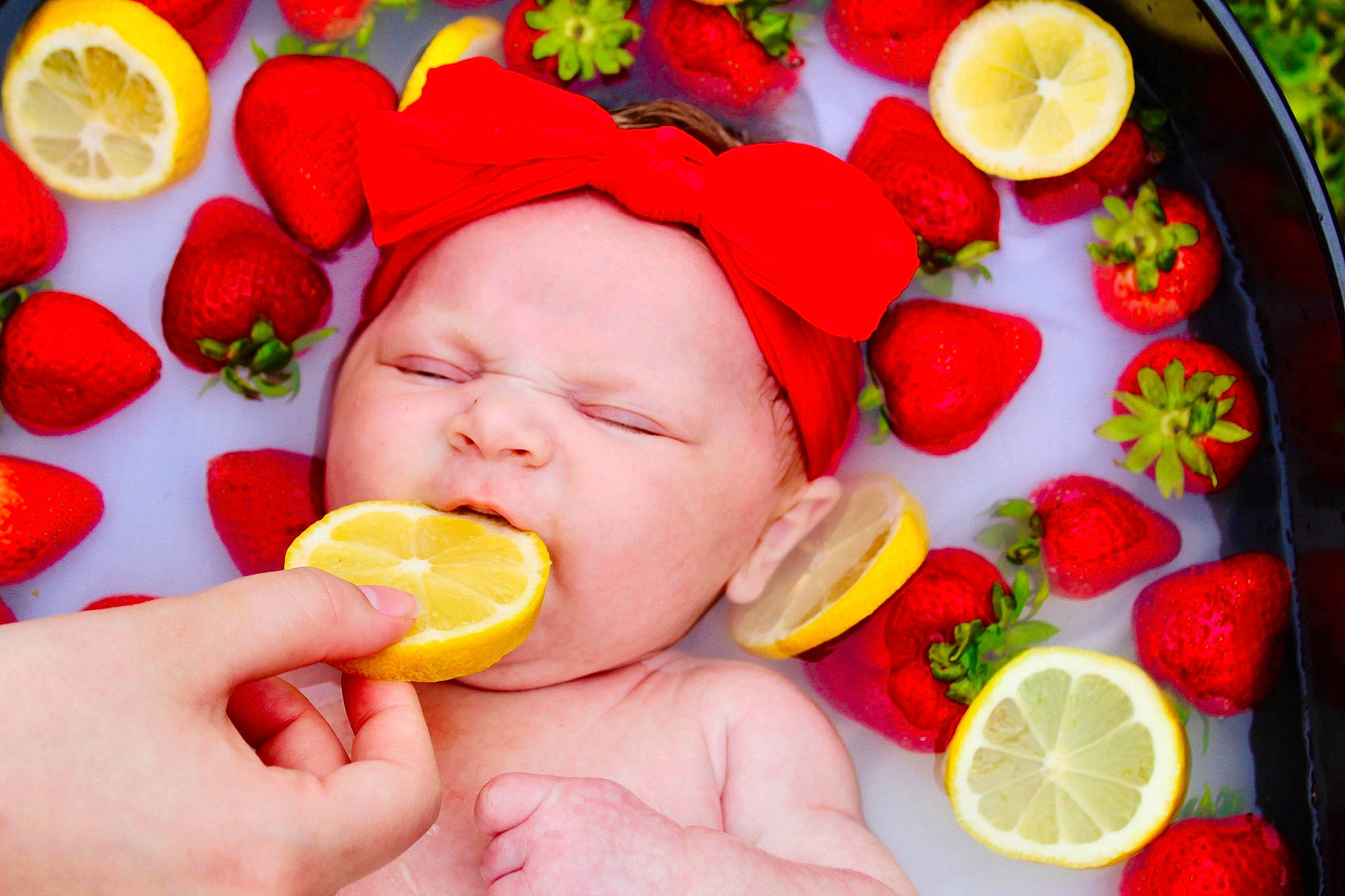 Alyvia is registered to the contest to win money with this photo: baby, child, citrus, food, fruit, headwear, orange, person, plant, skin, sweetness, toddler