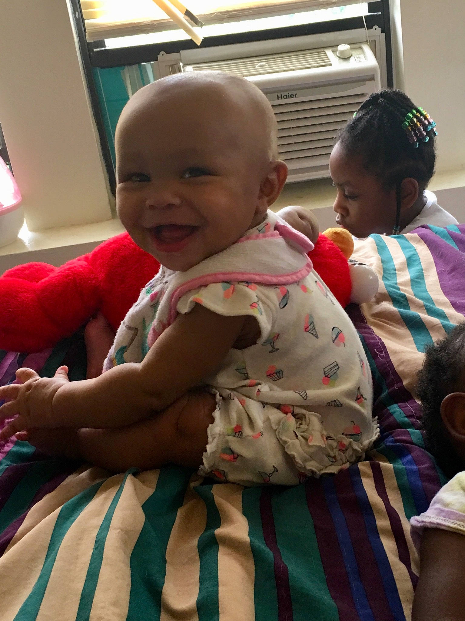 Chyla is registered to the contest to win money with this photo: adaptation, baby, cheek, child, joy, people, person, sitting, skin, smile, textile, toddler