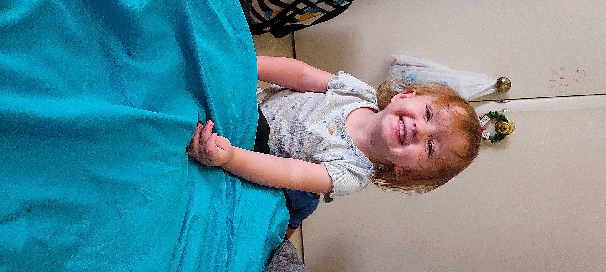 Diana is registered to the contest to win money with this photo: abdomen, arm, baby, child, comfort, elbow, electric_blue, event, fun, gesture, happy, joint, joy, mouth, person, room, shoulder, sitting, skin, smile