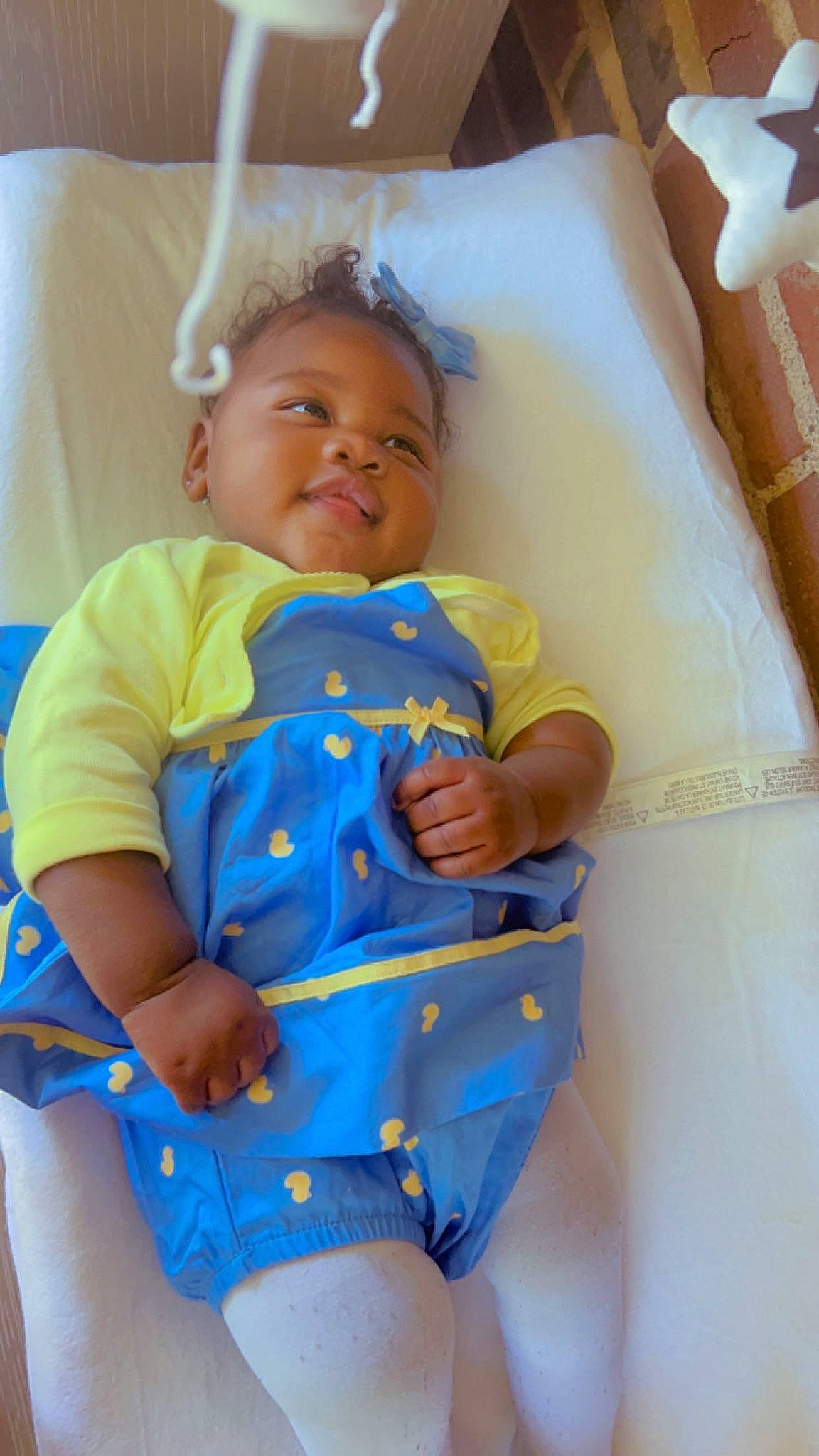 Majesty is registered to the contest to win money with this photo: arm, baby, baby_toddler_clothing, child, comfort, electric_blue, finger, fun, hairstyle, hand, happy, neck, person, product, shoulder, skin, sleeve, smile, textile, thigh