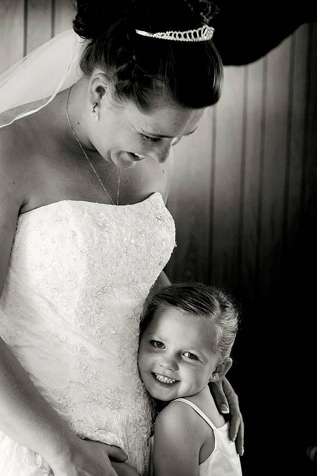 Jacey is registered to the contest to win money with this photo: black_and_white, bridal_accessory, bridal_clothing, bride, child, dress, flash_photography, gown, hair_accessory, hairstyle, happy, headpiece, joy, monochrome, monochrome_photography, person, photograph, photography, shoulder, smile