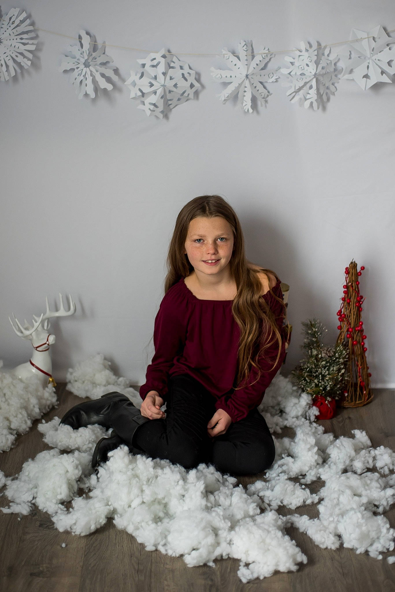Jacey is registered to the contest to win money with this photo: child, flower, joy, person, photography, plant, room, sitting, snow, winter