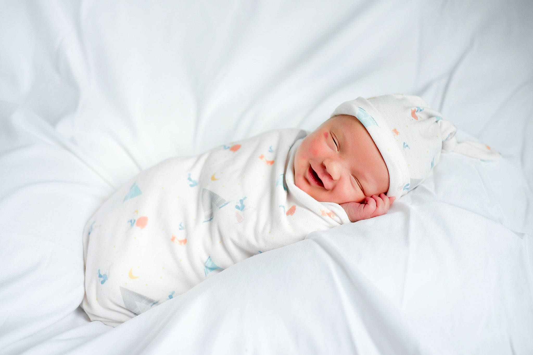 Ledger is registered to the contest to win money with this photo: baby, baby_products, baby_sleeping, baby_toddler_clothing, bedding, bedtime, blanket, child, comfort, event, hat, headwear, linens, nap, pattern, peach, person, portrait_photography, skin, sleep