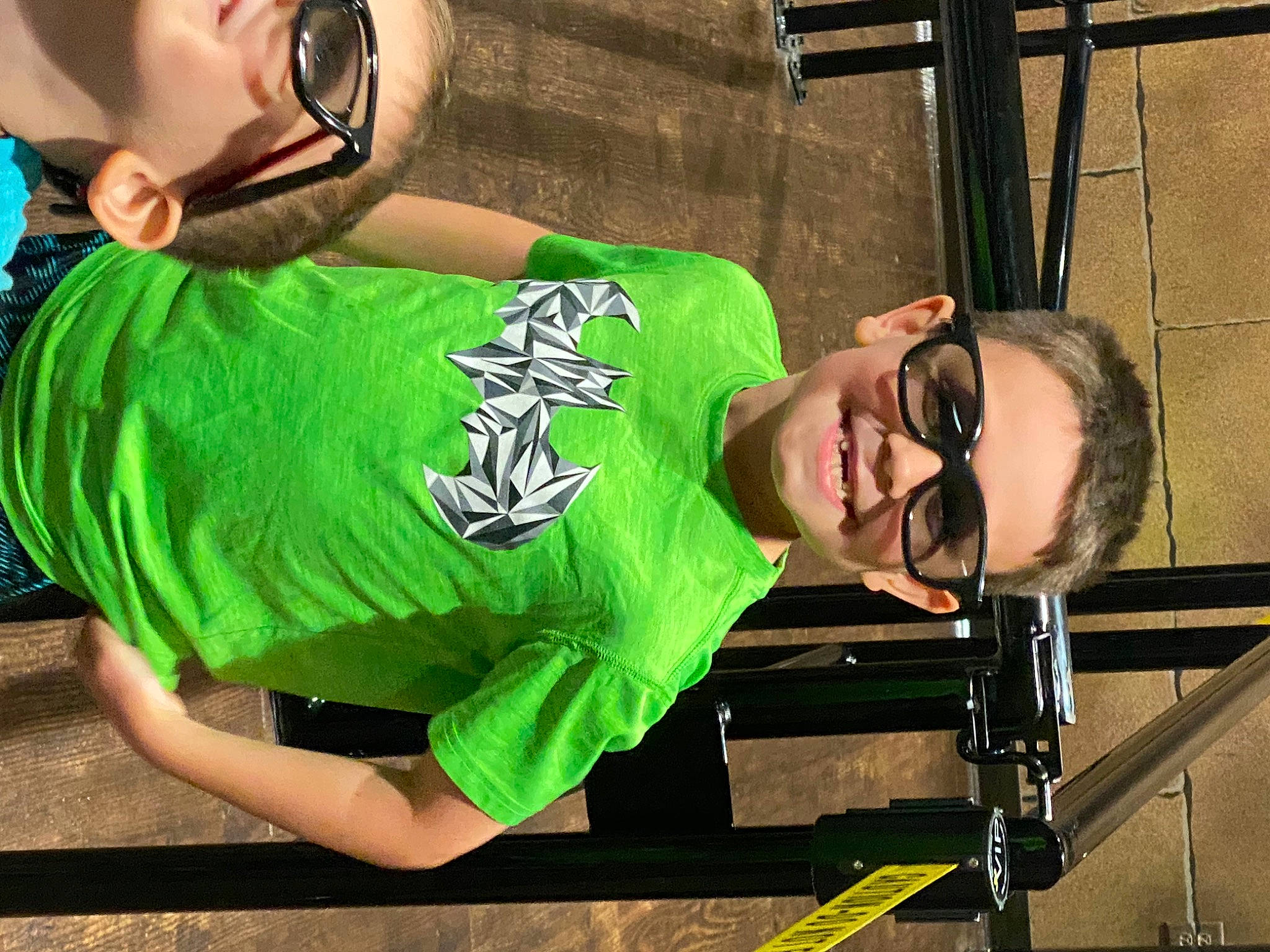 Ryan is registered to the contest to win money with this photo: cool, eyewear, fun, hat, headphones, human_leg, joint, joy, knee, leisure, person, personal_protective_equipment, physical_fitness, recreation, shorts, shoulder, sitting, sleeve, sportswear, street_fashion