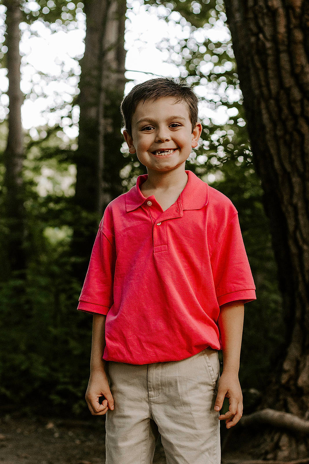 Ryan joined the competition — help win amazing prizes! child, chin, facial_expression, flash_photography, forest, fun, gesture, grass, happy, joy, leisure, people_in_nature, person, plant, sky, sleeve, smile, standing, t_shirt, toddler