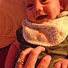 Kingslee is registered to the contest to win money with this photo: baby, infant, smiling, hand, rings, bib, clothing, cute, happy, skin, face, person, child, tickling, warm, cozy, indoor, portrait, expression, human