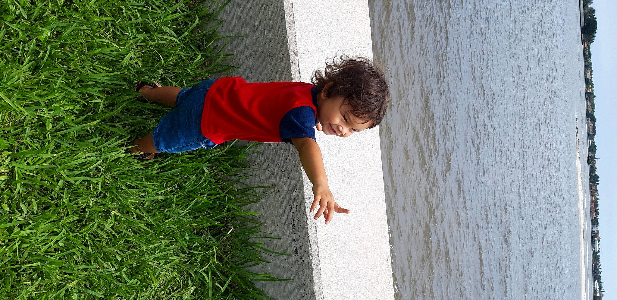 Nathanial is registered to the contest to win money with this photo: child, grass, person