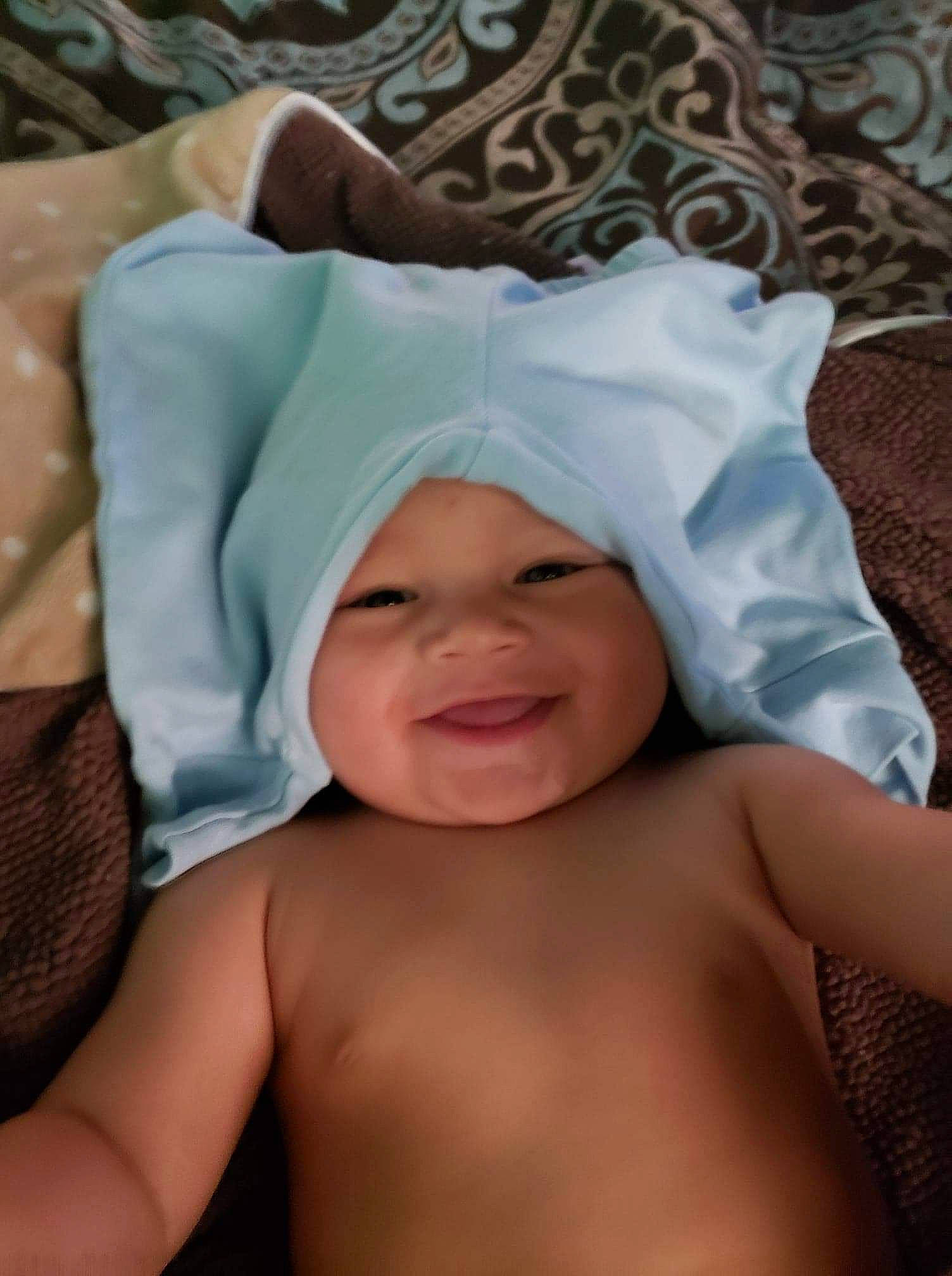 Nathanial is registered to the contest to win money with this photo: baby, child, headgear, headwear, joy, person, toddler