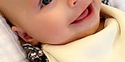 Avalena is registered to the contest to win money with this photo: baby, blanket, bodypart, bonnet, clothing, cushion, face, finger, hand, happy, hat, head, homedecor, mouth, newborn, person, photography, portrait, quilt, smile