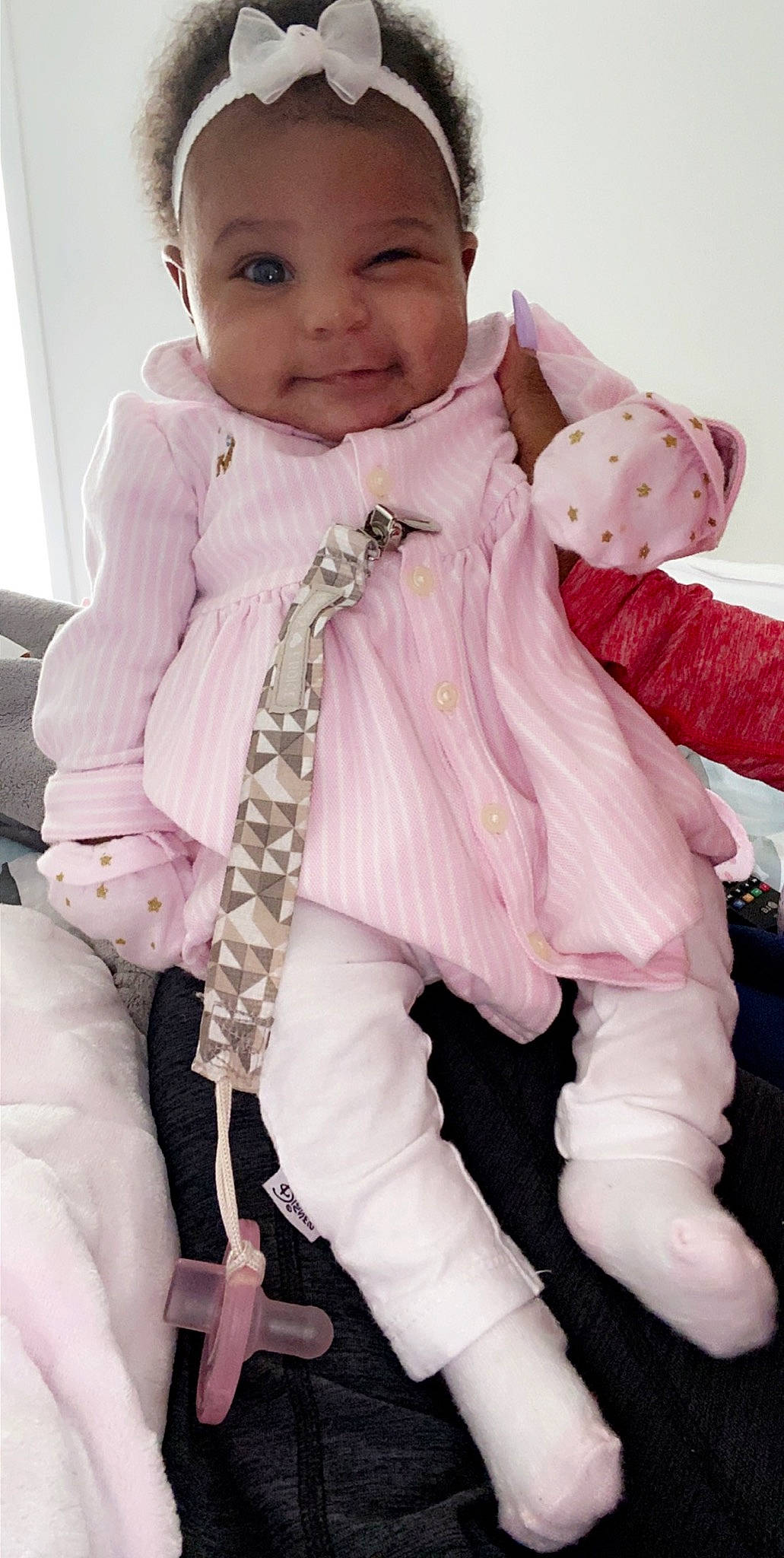 Ayva joined the competition — help win amazing prizes! baby, cheek, child, child_model, dress, fashion_accessory, fur, joint, lip, outerwear, person, pink, sitting, skin, sleeve, smile, toddler