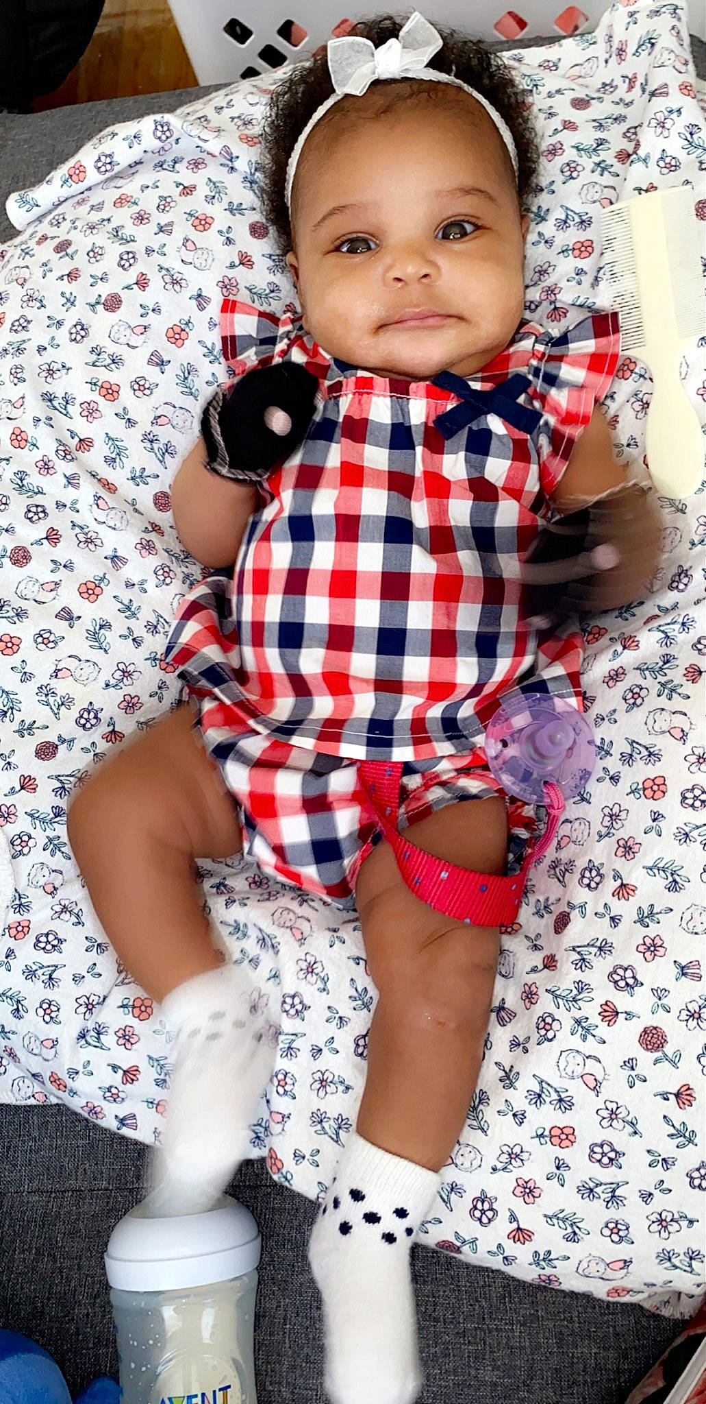 Ayva is registered to the contest to win money with this photo: baby, baby_products, baby_toddler_clothing, cheek, child, child_model, clothing, design, leg, pattern, person, plaid, product, sleeve, textile, thigh, toddler