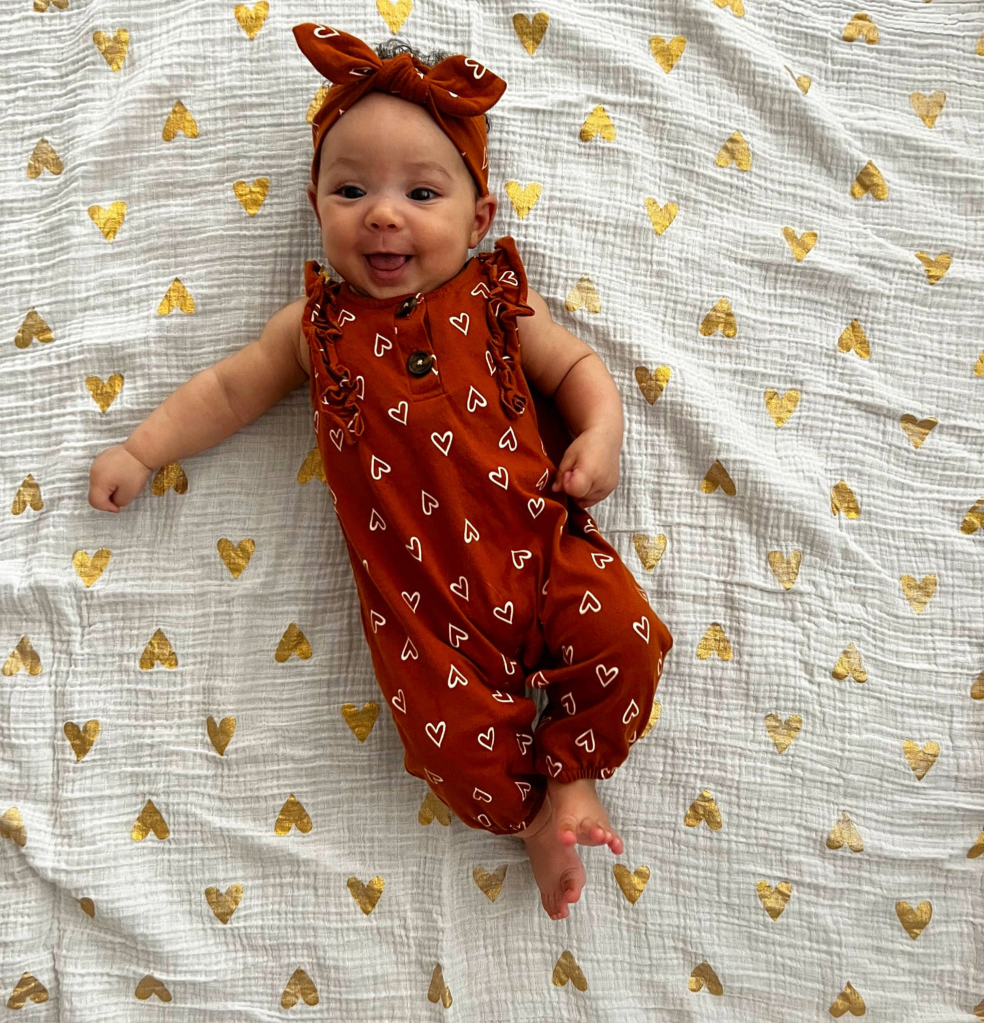 Kaylani joined the competition — help win amazing prizes! baby, baby_toddler_clothing, child, happy, headpiece, headwear, linens, pattern, people_in_nature, person, polka_dot, sleeve, smile, textile, thumb, toddler